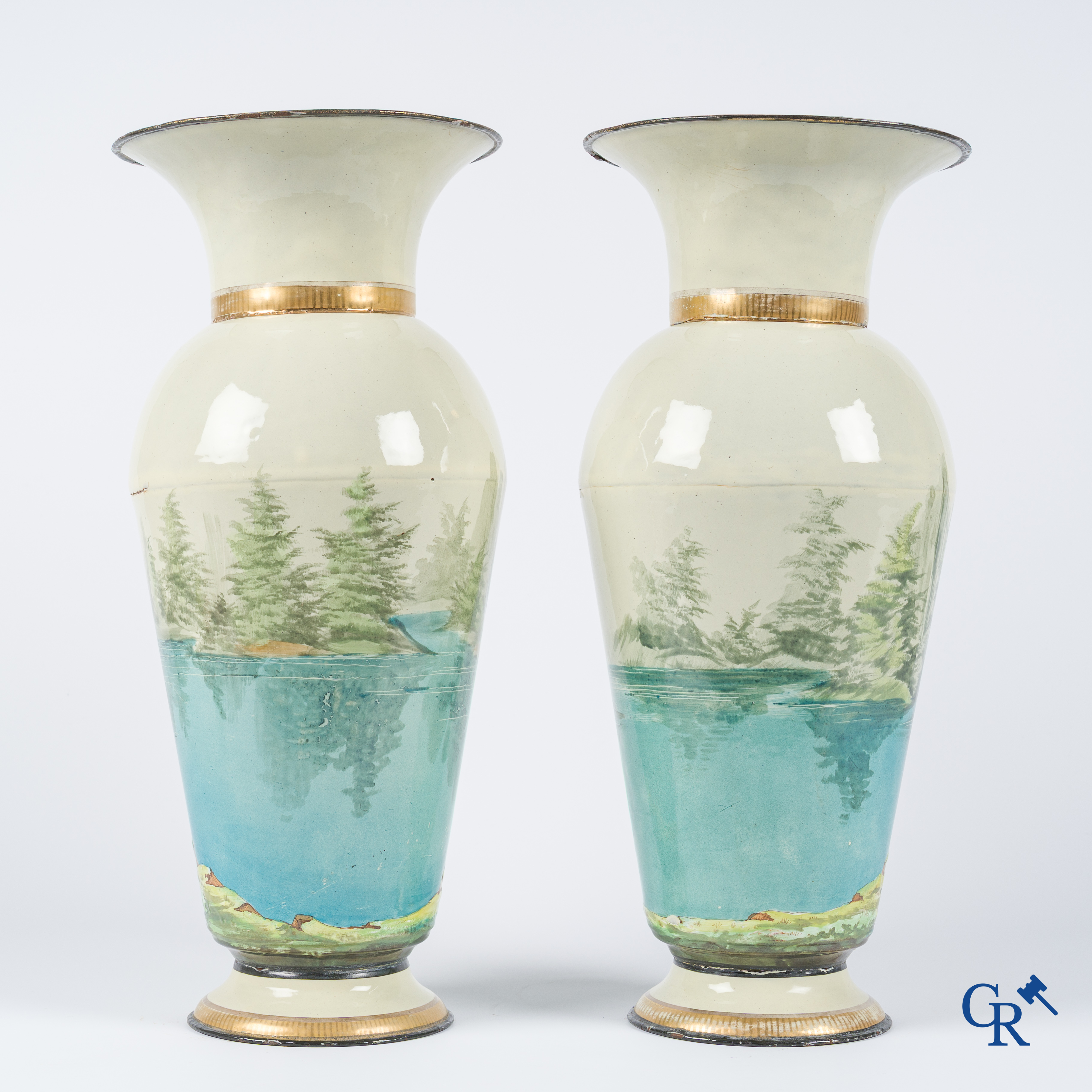 Pair of embossed enamelled metal vases with a decor of birds. Circa 1900.