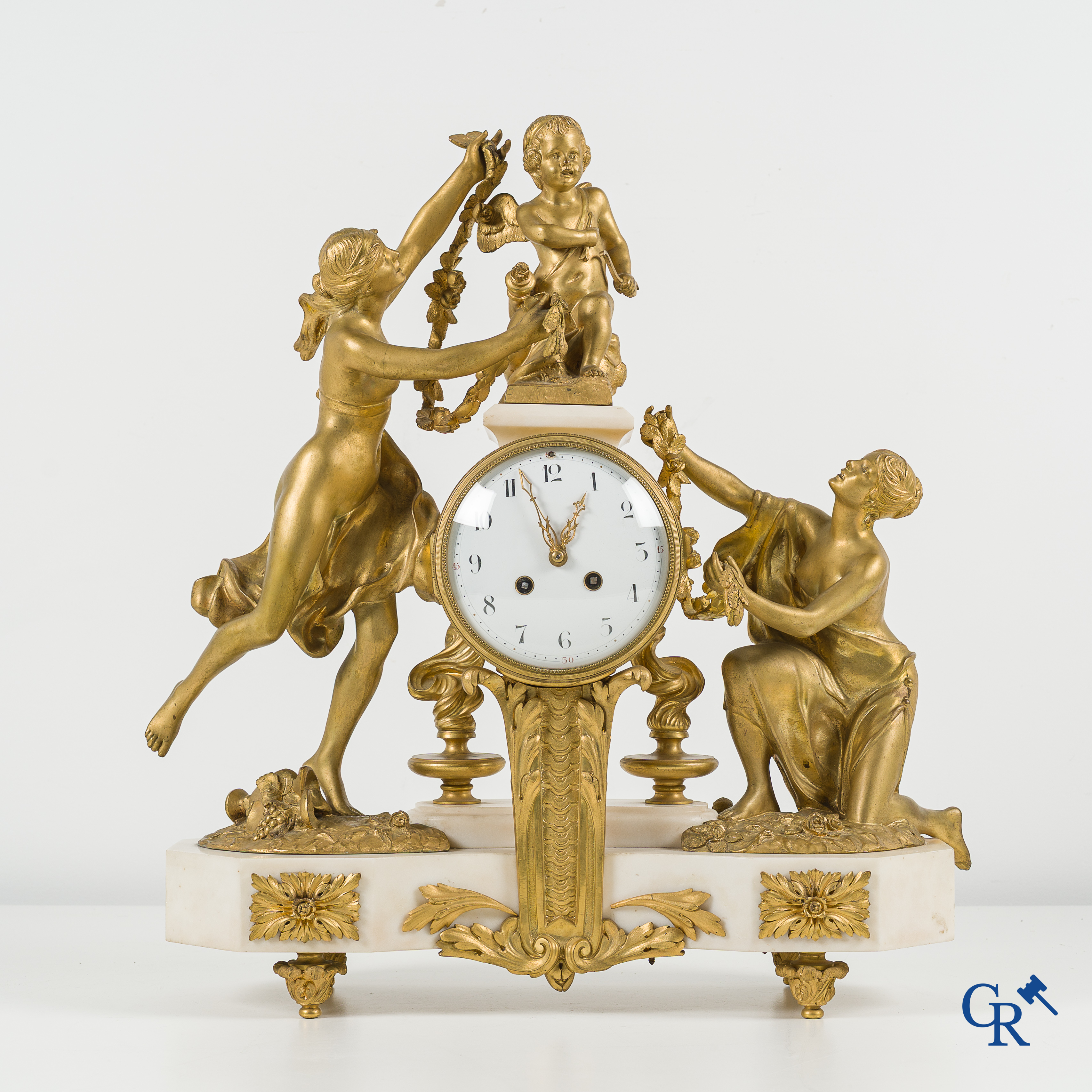 Imposing fireplace clock in white Carrara marble and gilded bronze, LXVI style. France, circa 1860.