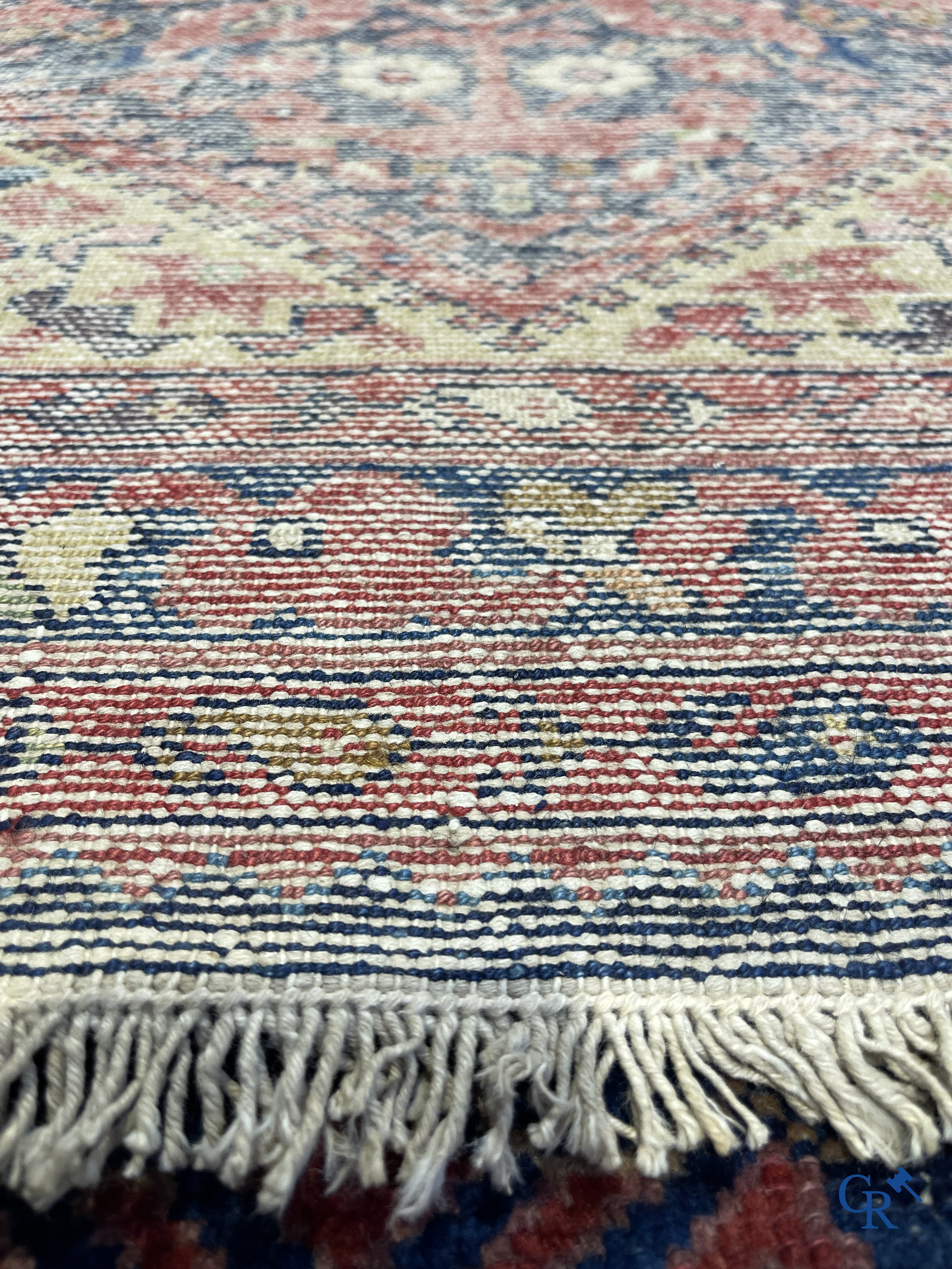 Oriental carpets: Antique hand-knotted Oriental carpet.