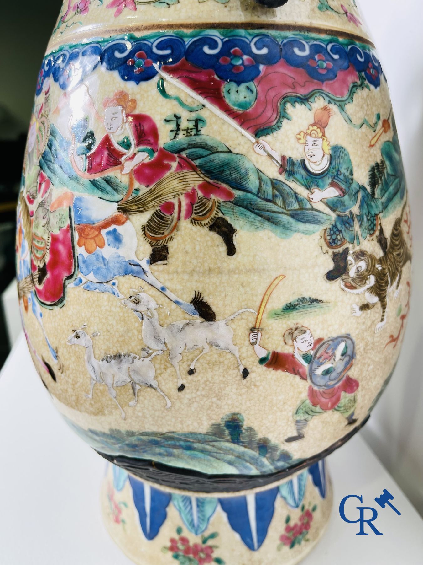 Asian Art: A pair of Chinese Nanking vases with famille rose decor.