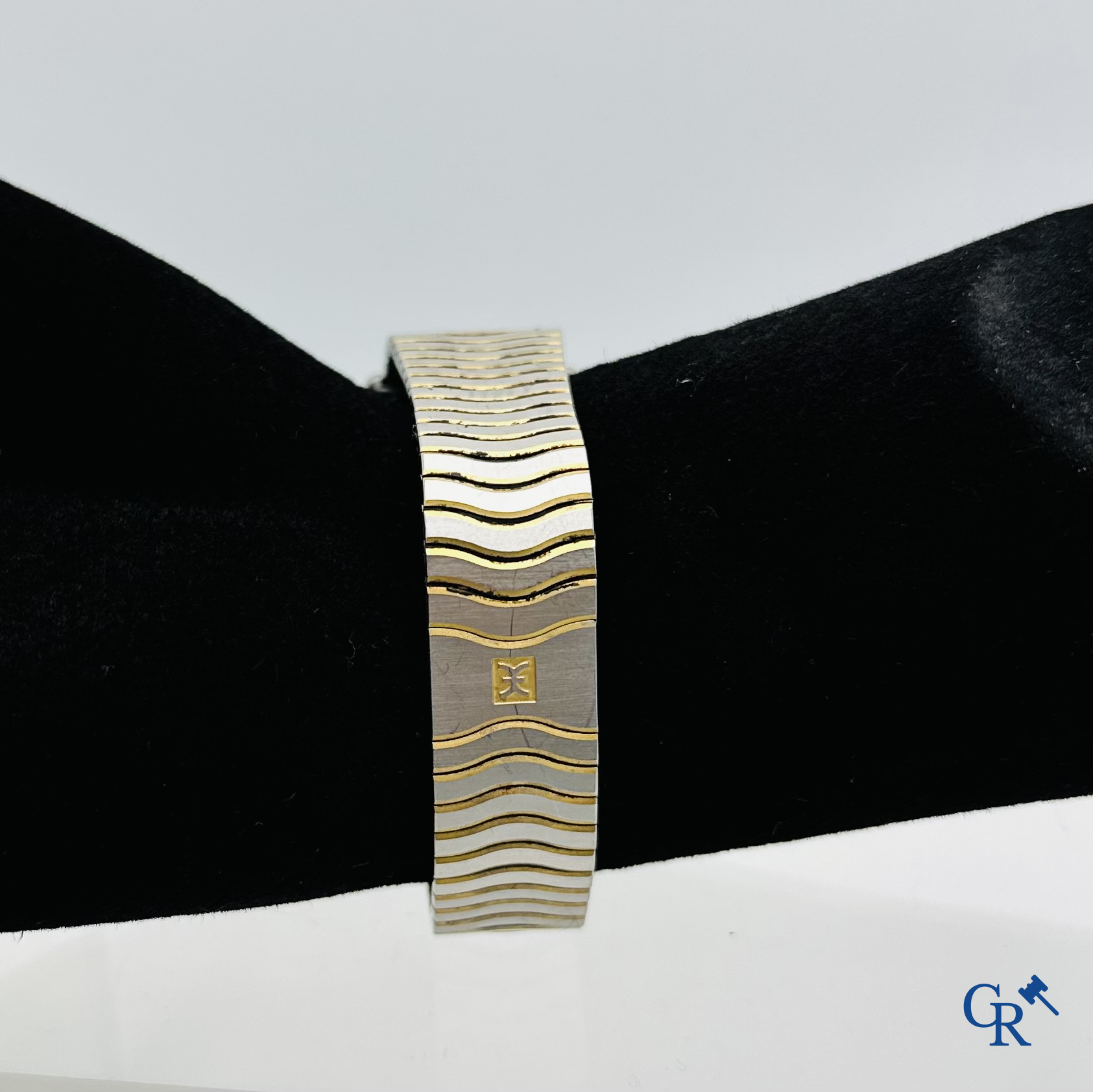 Ebel: Herenpolshorloge met armband in staal en bezel in goud 18K (750°00).