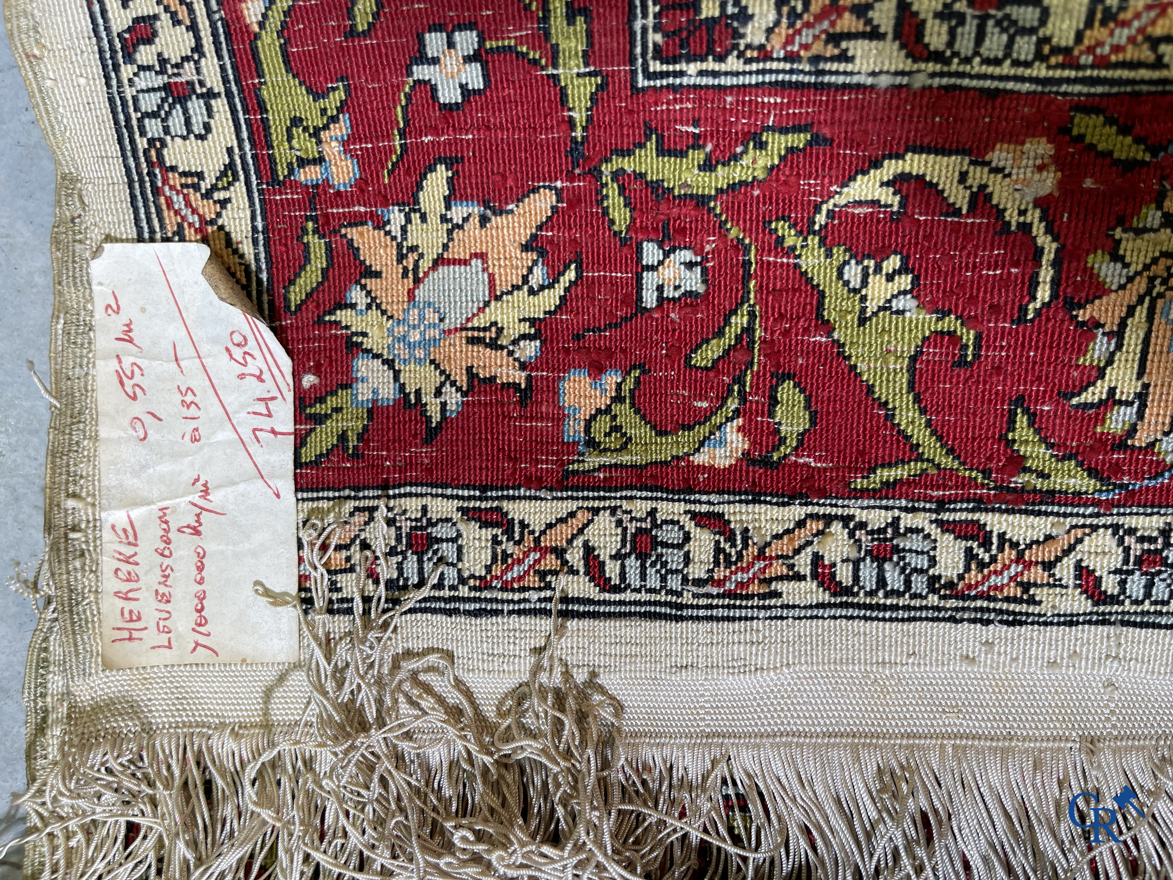 Oriental carpets, Hereke, a finely hand-knotted and signed silk carpet with a tree of life.