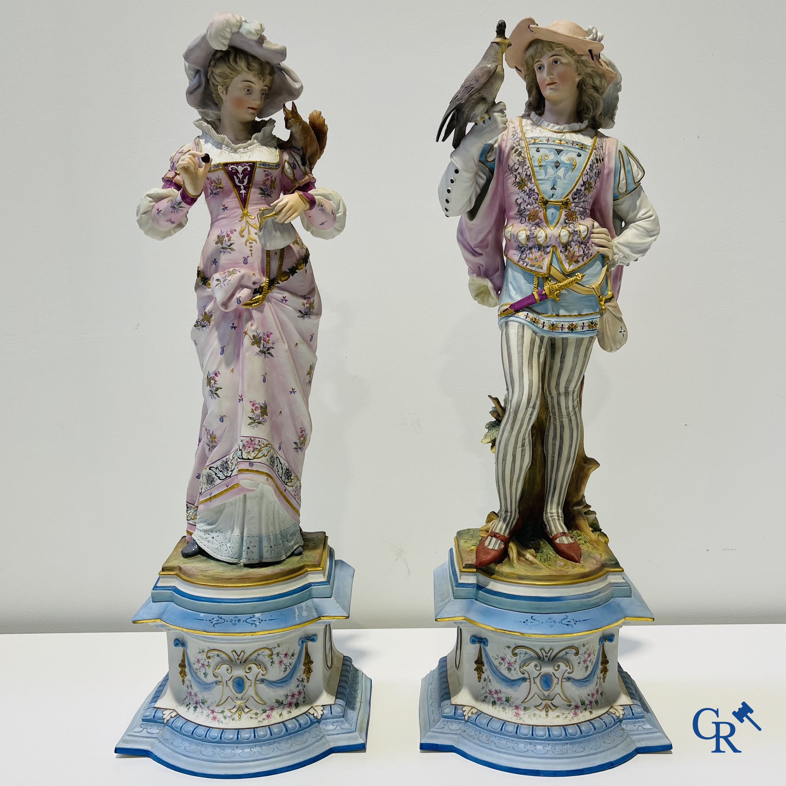 Exceptional pair of large statues in coloured and gilded biscuit porcelain. 2nd half of the 19th century.