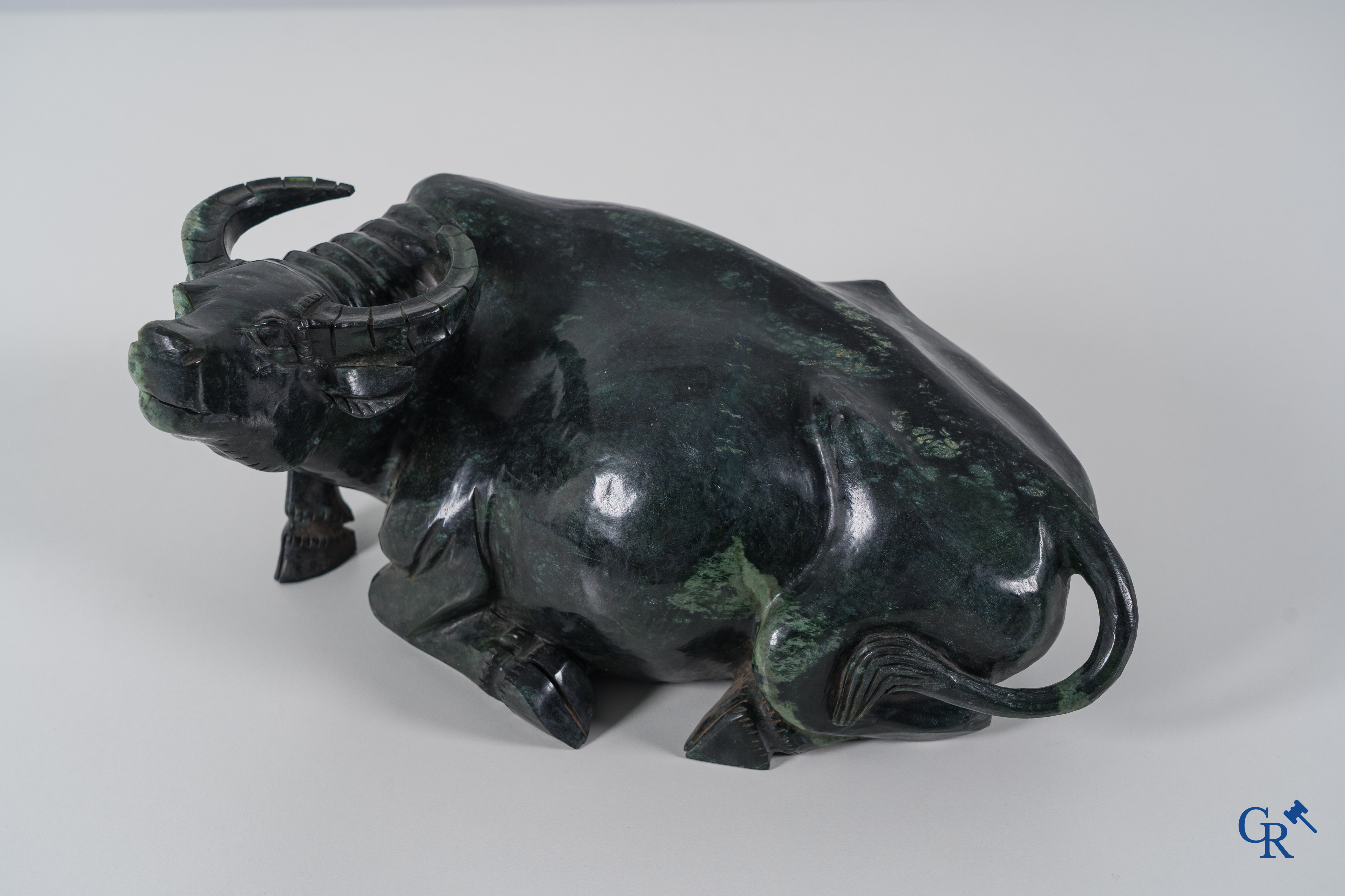 Asian Art: A Chinese water buffalo and a standing Guanyin in Jadeite. 2nd half of the 20th century.