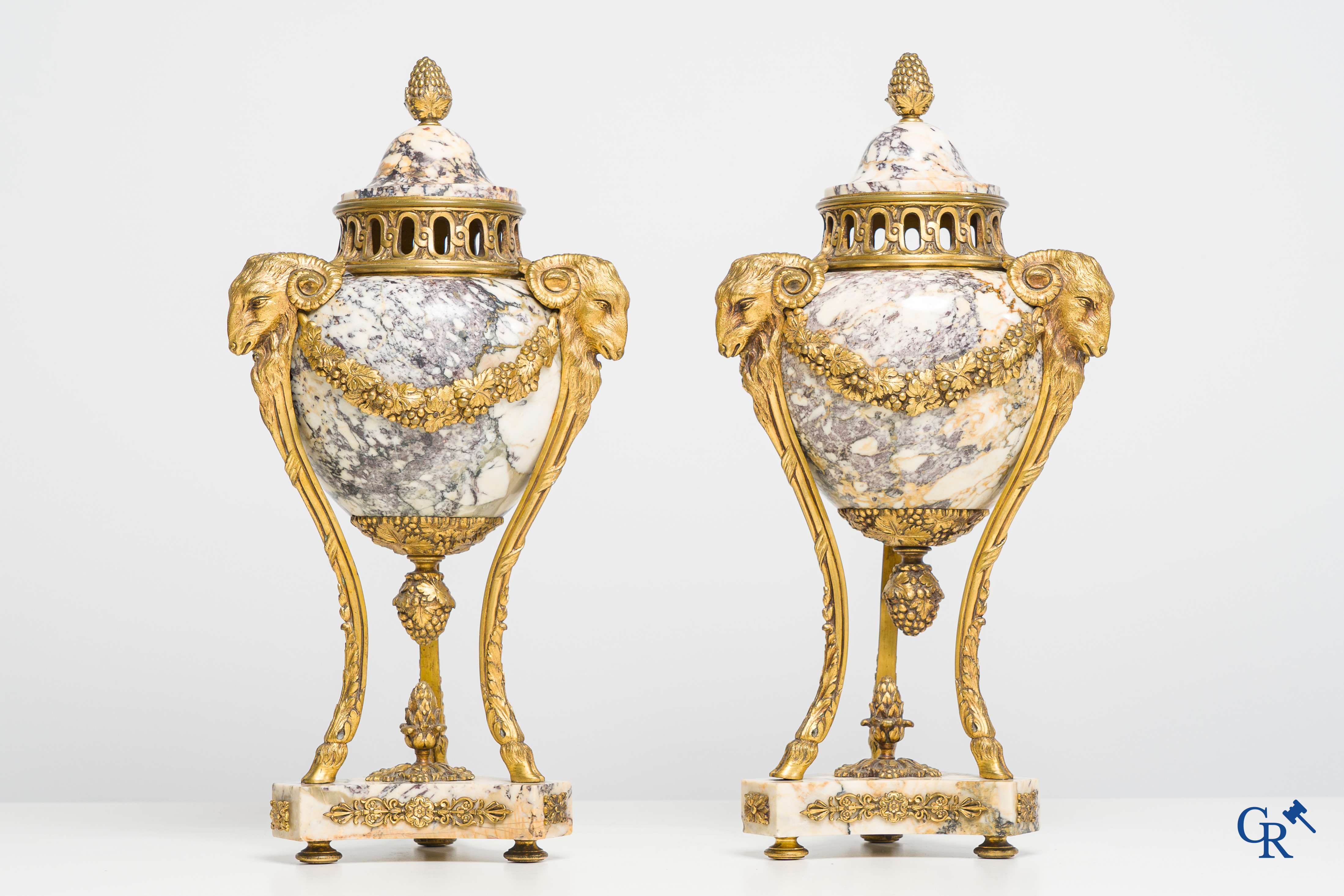 Pair of cassolettes in marble brèche violette with finely decorated and gilded bronze frames. Louis XVI style. 