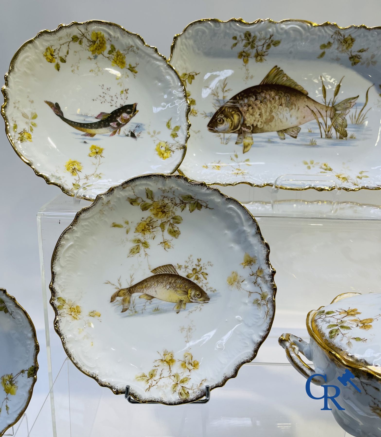 Extraordinary tableware in Brussels porcelain with a theme of freshwater fish.