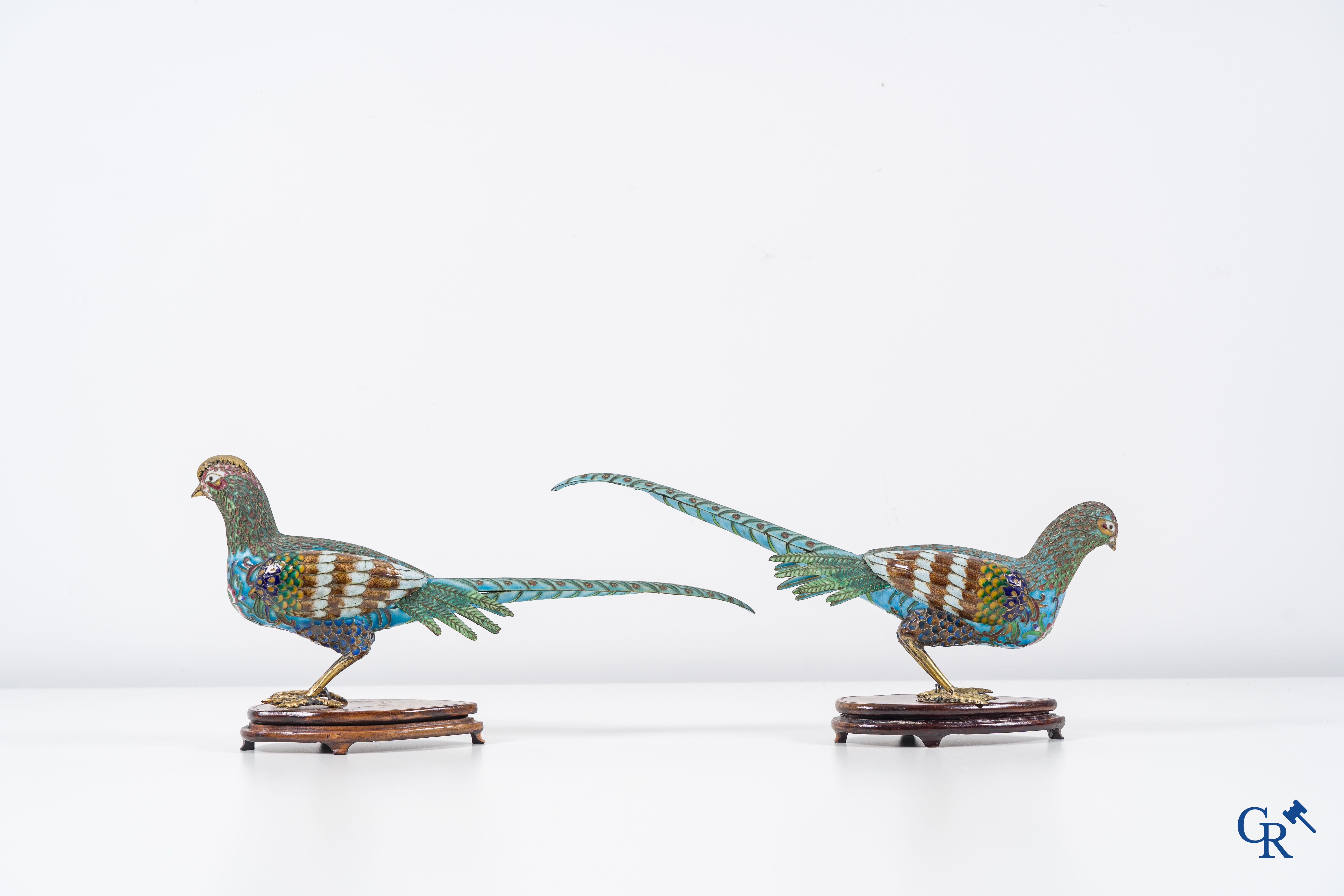 Asian Art: Chinese cloisonné. A pair of pheasants in finely crafted cloisonné. 20th century.