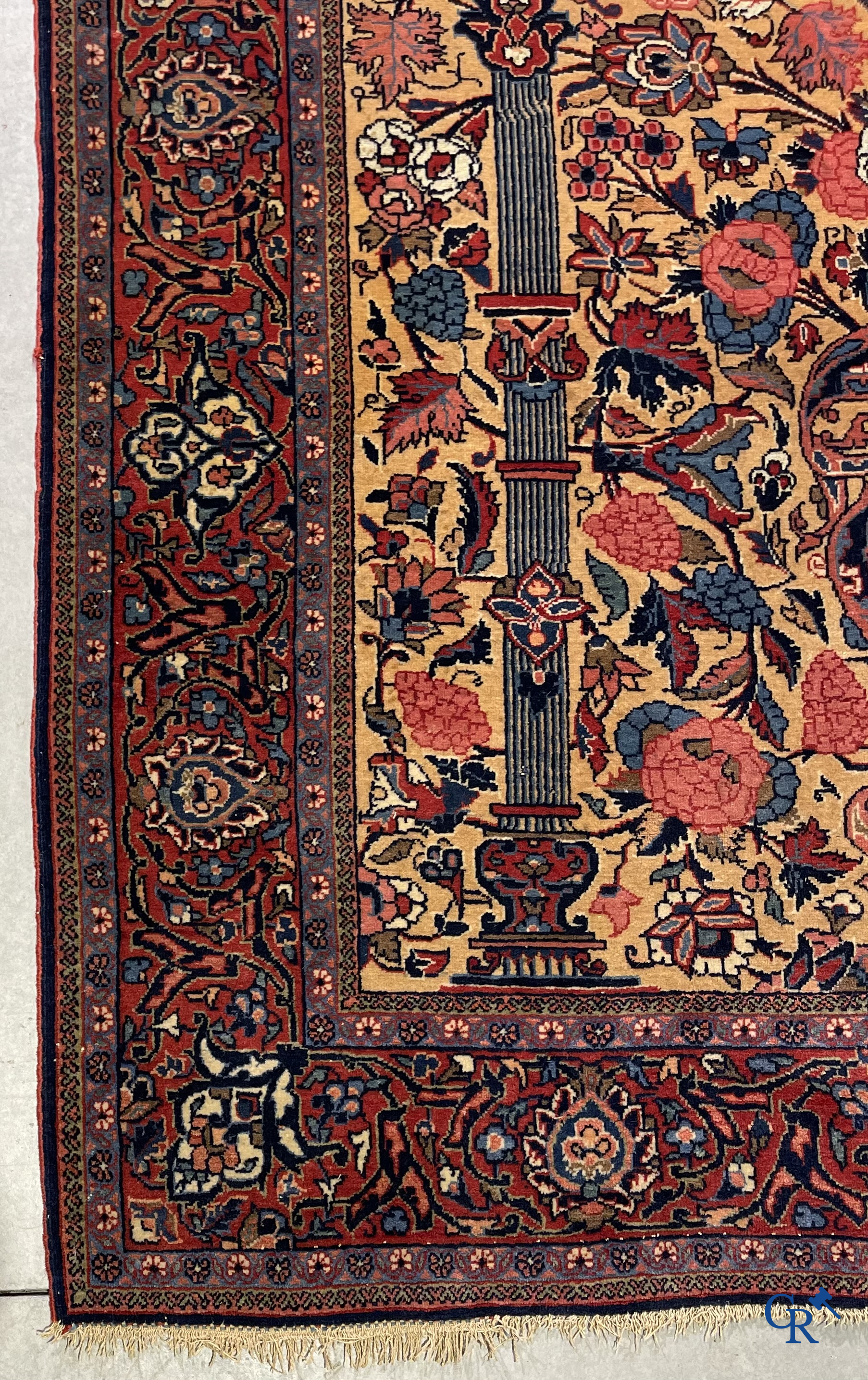 Oriental carpets: Iran. 2 antique hand-knotted Persian carpets with floral decor.