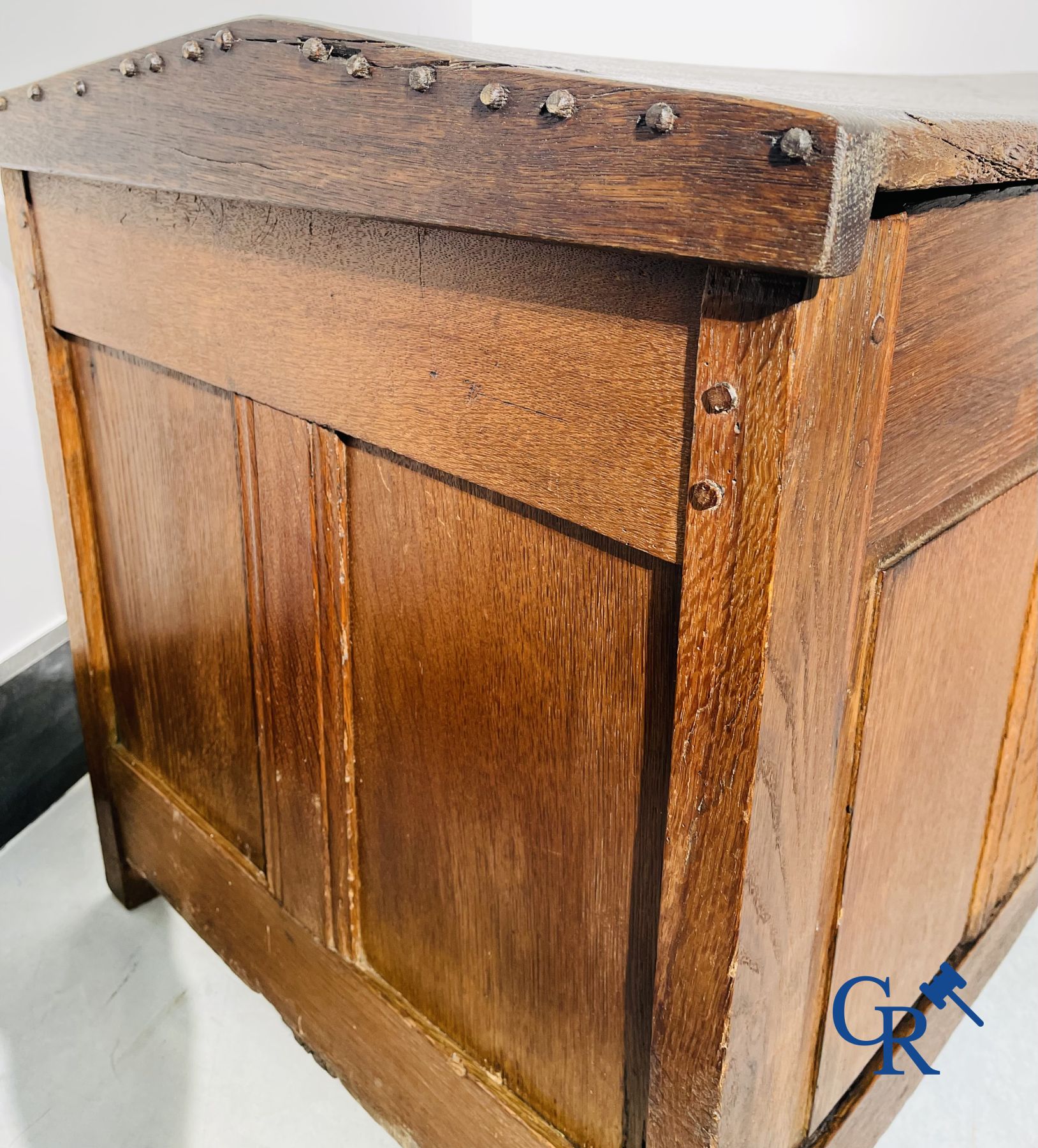 2 oak chests and an antique cast iron fireplace plate.