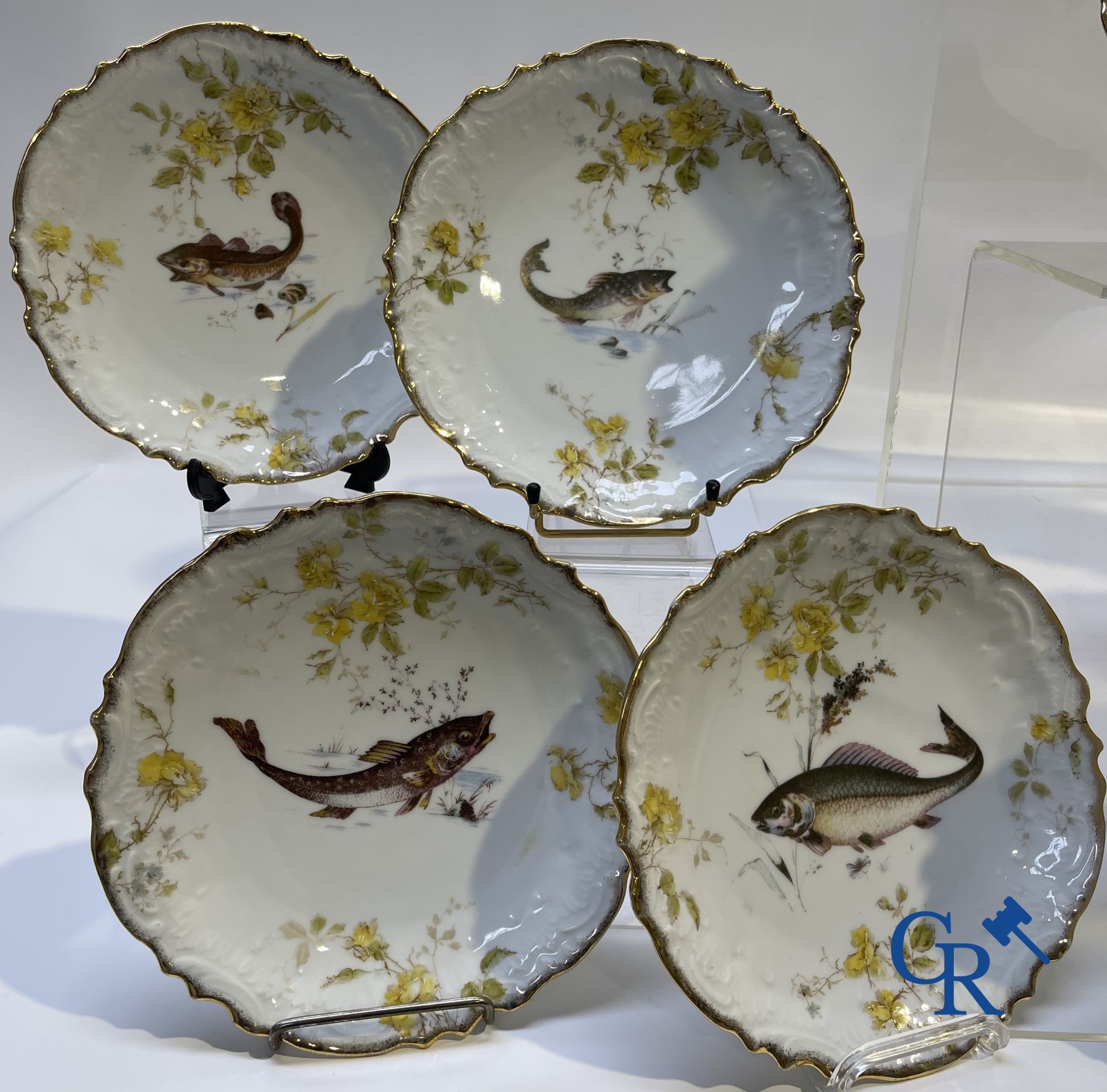 Extraordinary tableware in Brussels porcelain with a theme of freshwater fish.