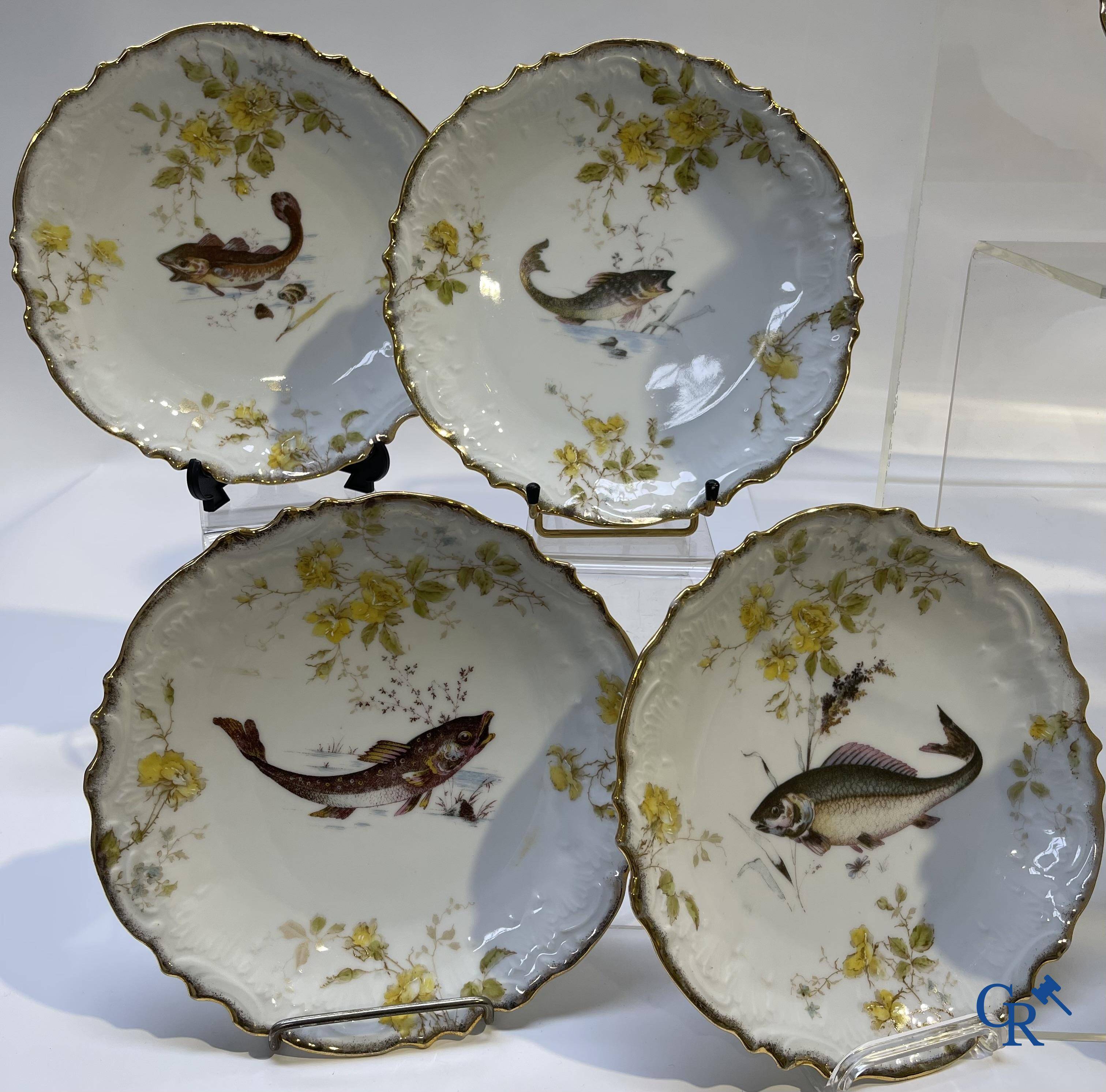 Extraordinary tableware in Brussels porcelain with a theme of freshwater fish.