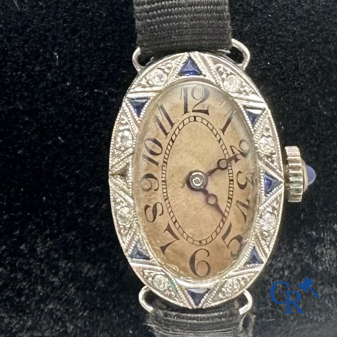 Jewellery - Timepiece: Art Deco ladies watch in Platinum.