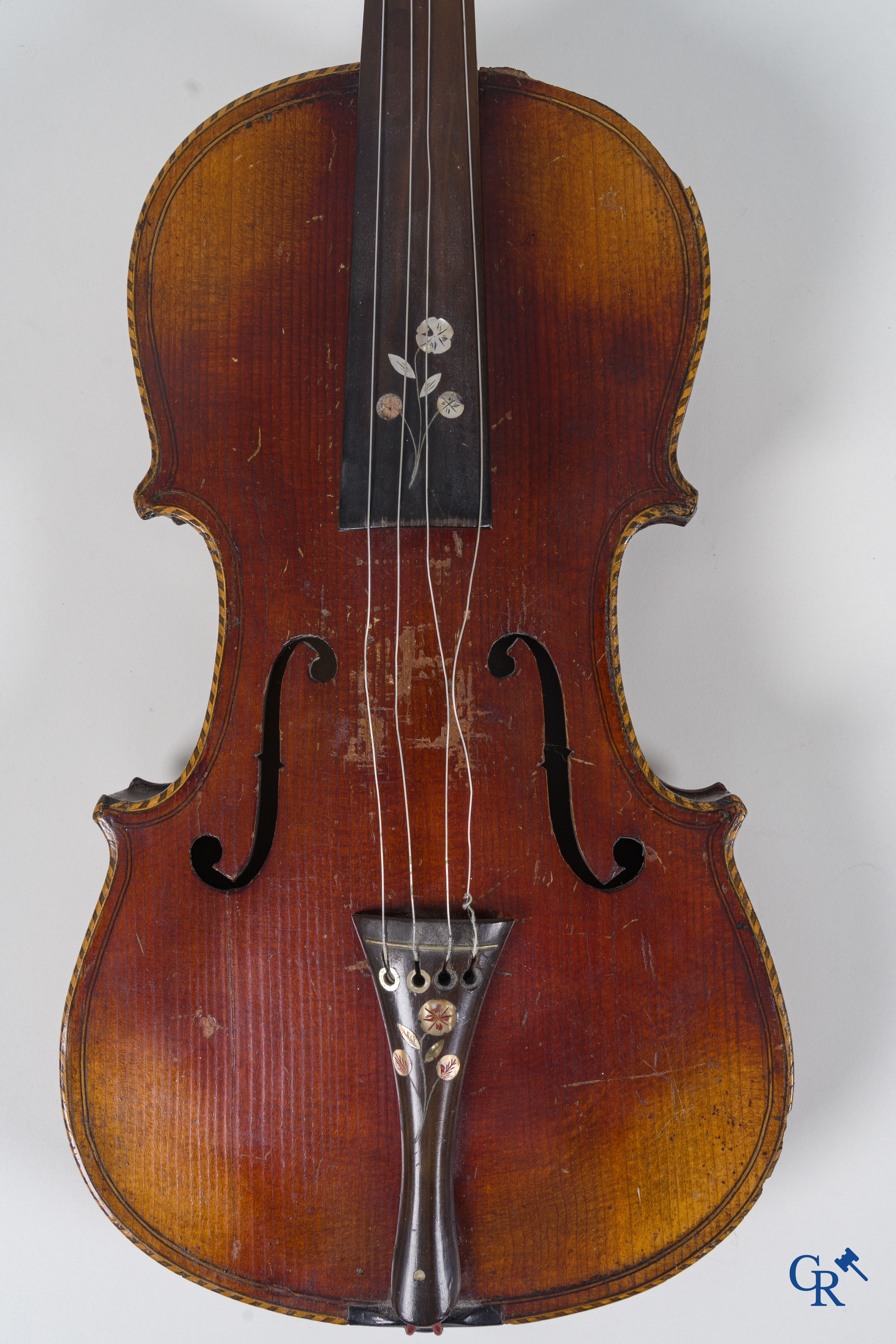 Musical instrument: Violin decorated with mother-of-pearl.