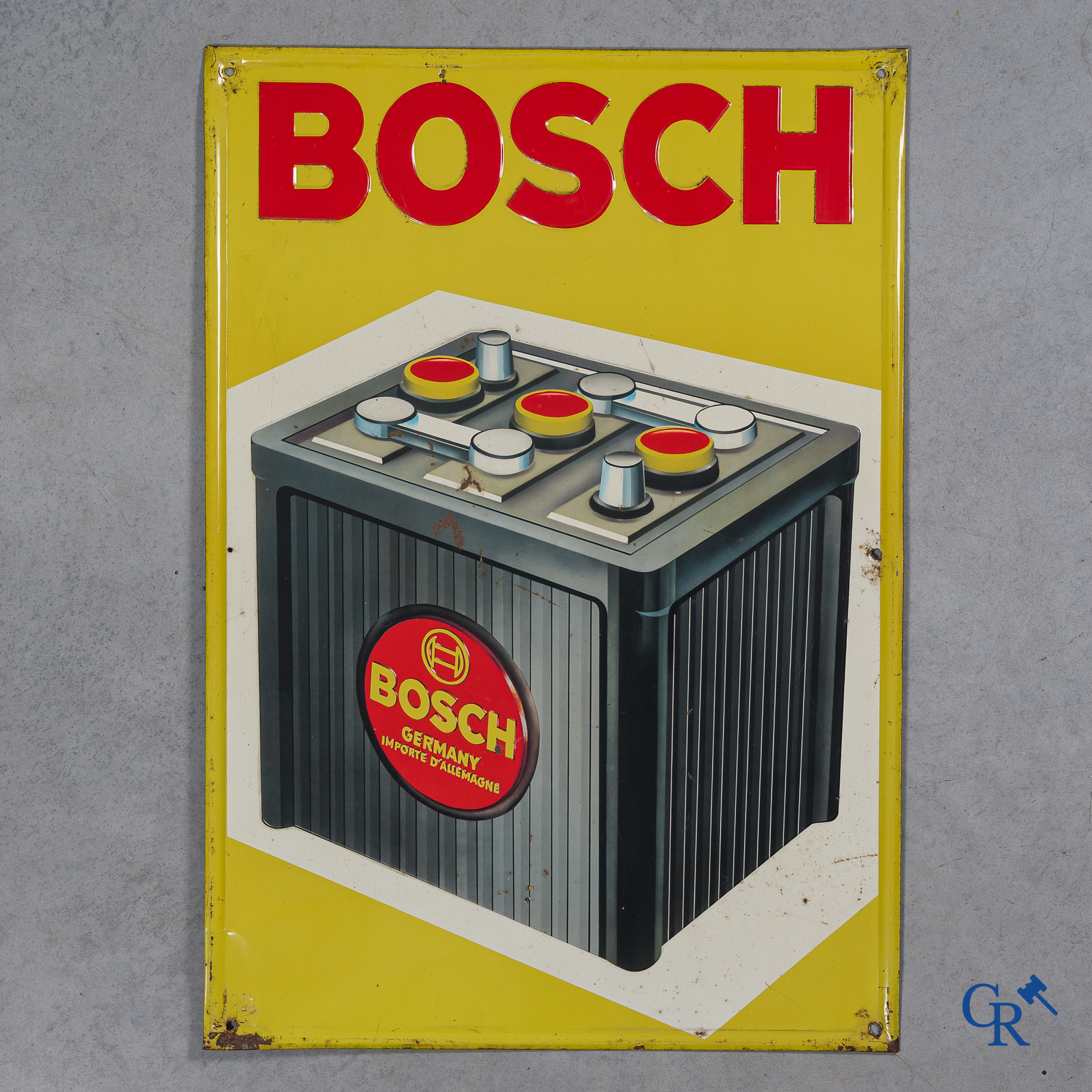 Bosch. Groot publiciteitsbord in beschilderd blik in reliëf voor accu's of autobatterijen van Bosch.