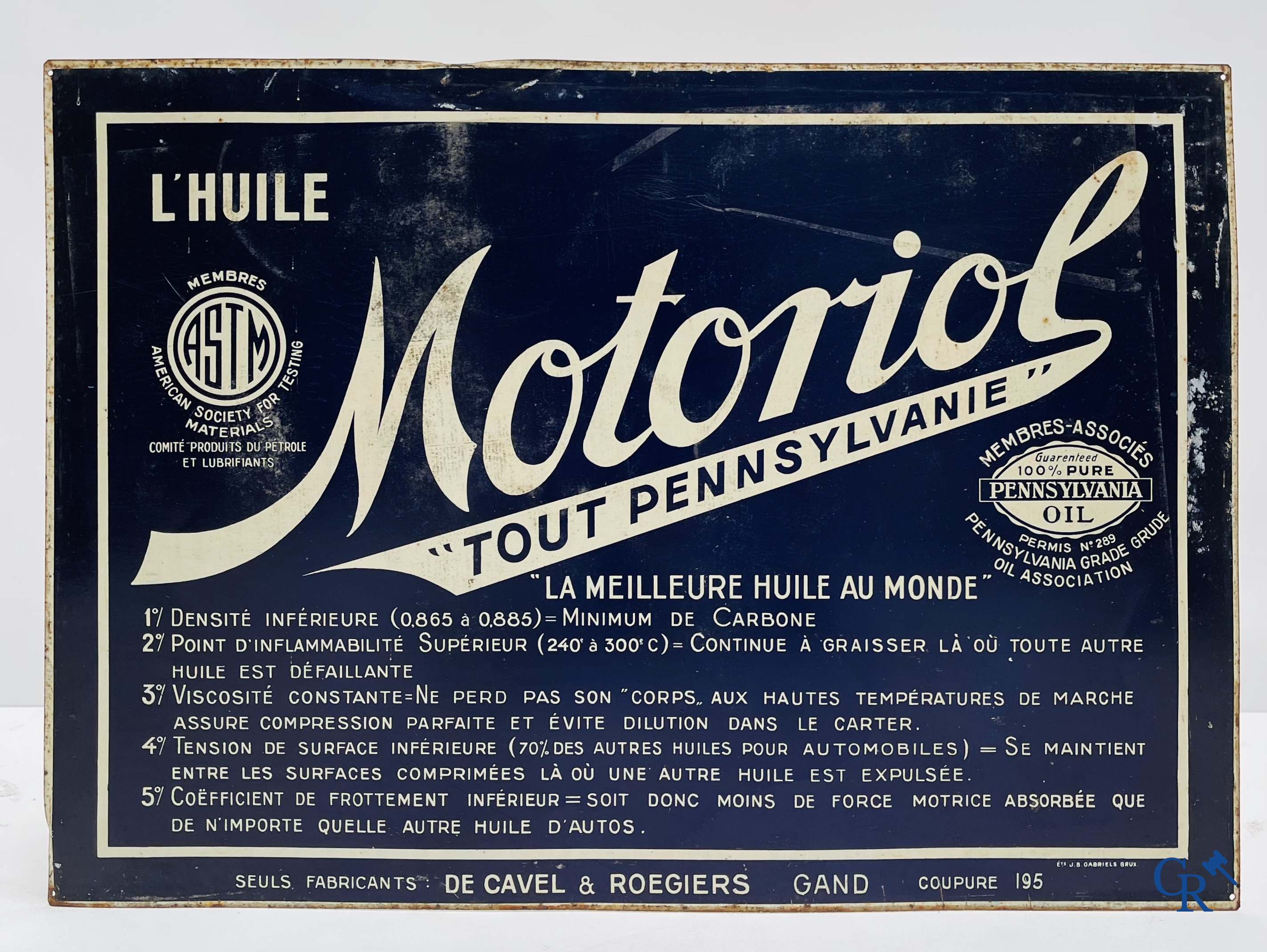 Huile Motoriol. Panneau publicitaire en tôle lithographiée pour les huiles des fabricants De Cavel & Rougiers à Gand. Vers 1940.