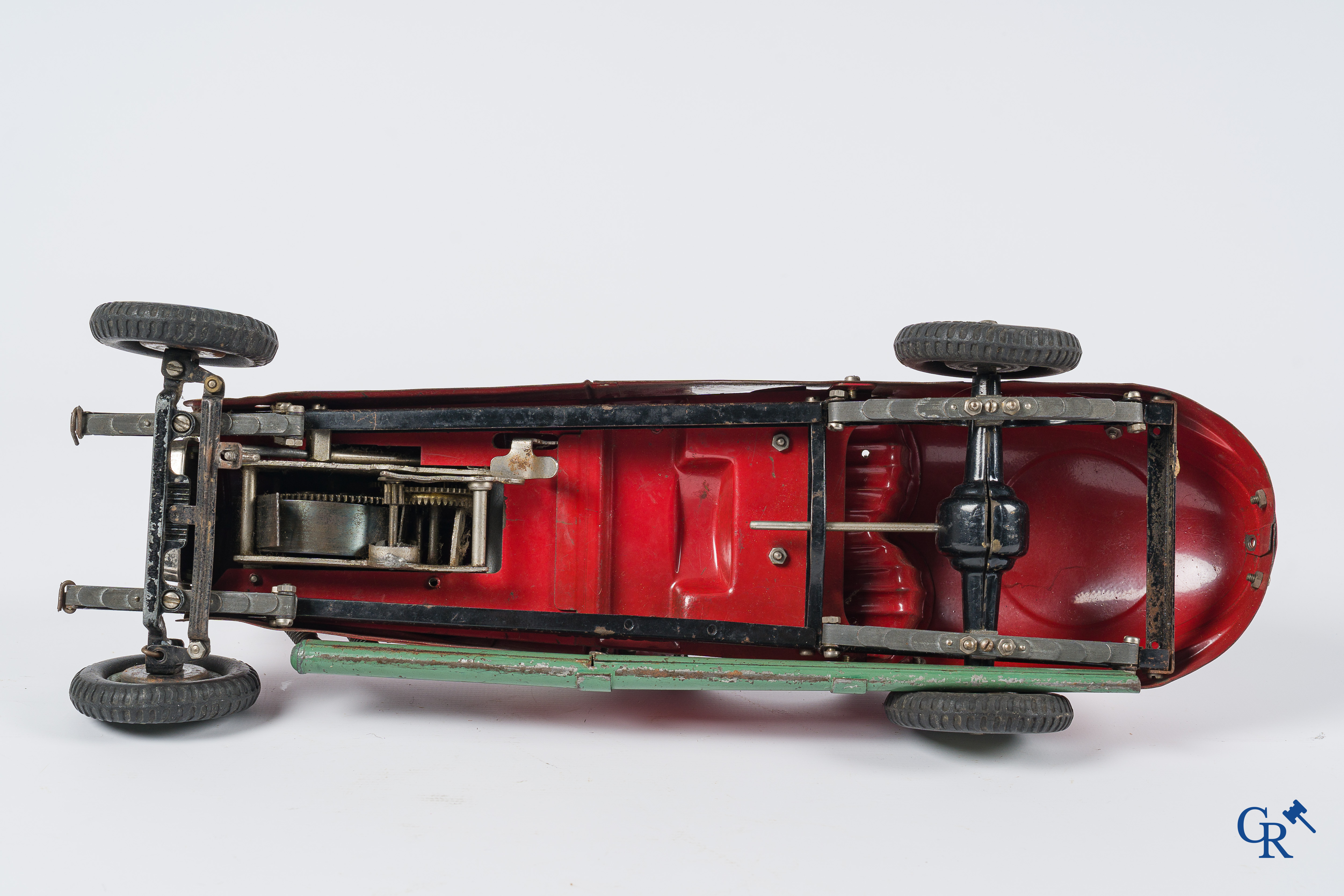 Märklin. Oud speelgoed. Originele opwindbare Mercedes modelauto in beschilderd blik. 30'er jaren.