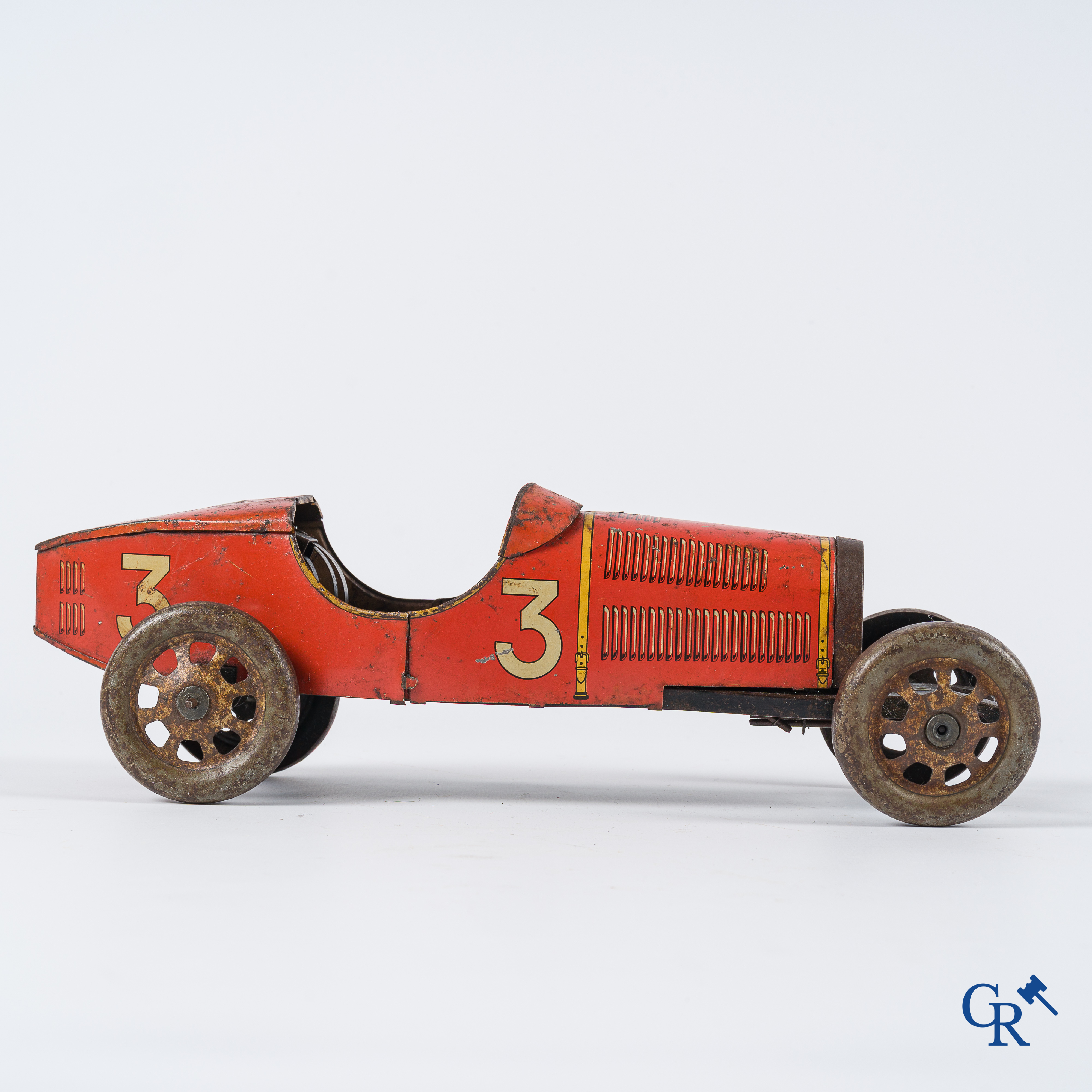 Oud Speelgoed. Jep, Frankrijk. Bugatti n°3, mechanische racewagen in beschilderd blik. Circa 1930.