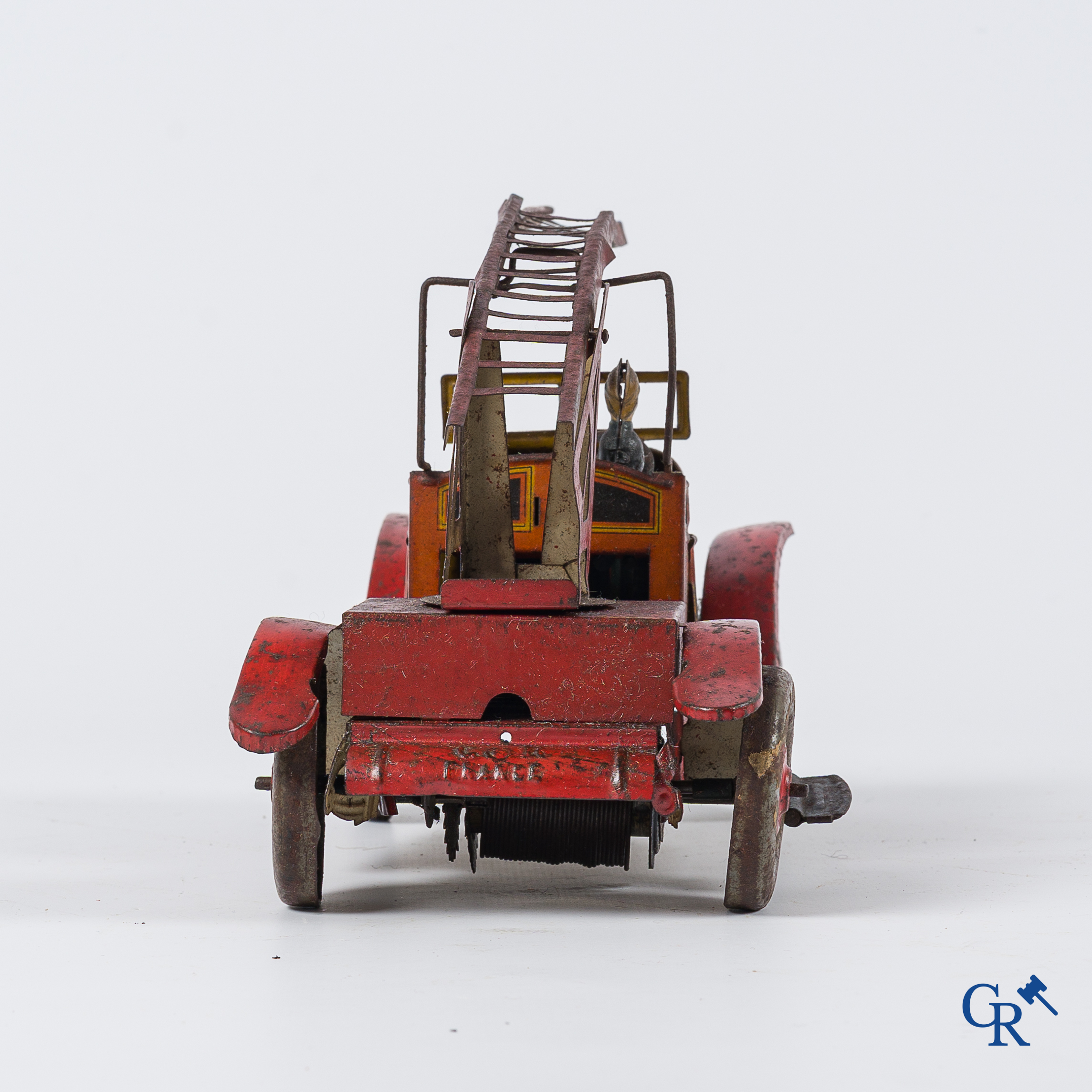 Oud speelgoed. Charles Rossignol, Frankrijk. Brandweerwagen in beschilderd blik.