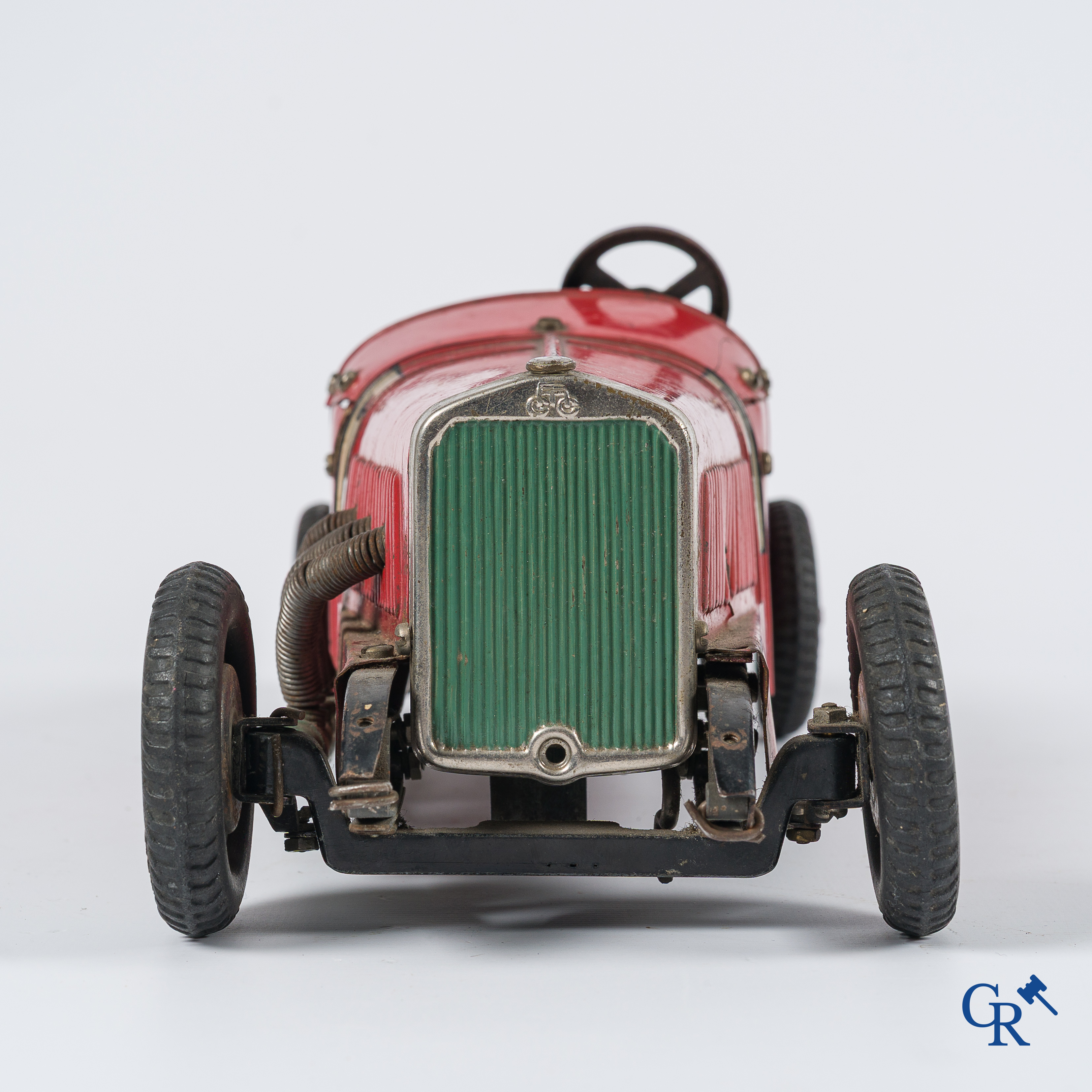 Märklin. Oud speelgoed. Originele opwindbare Mercedes modelauto in beschilderd blik. 30'er jaren.
