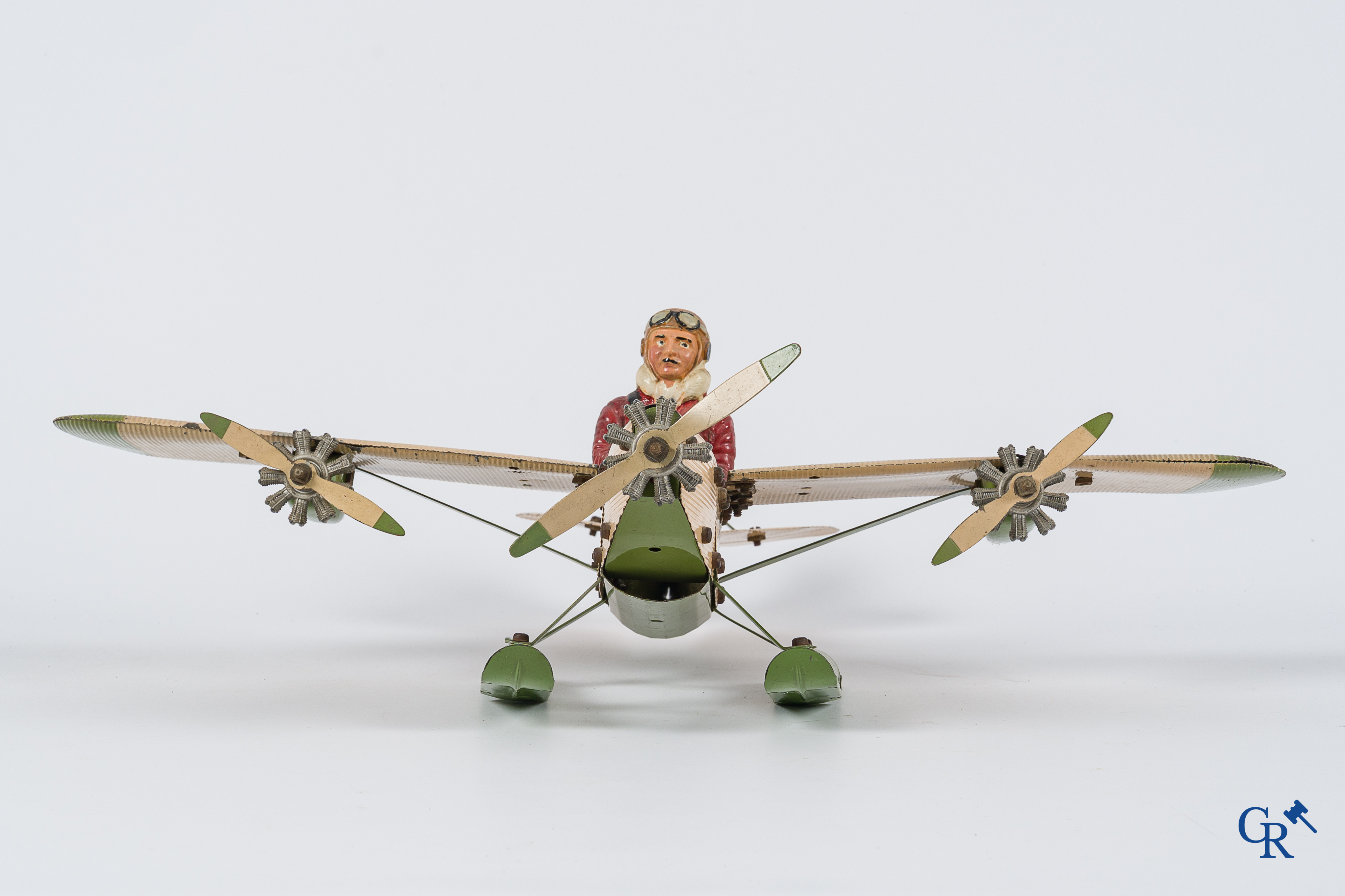 Oud speelgoed. Meccano Aeroplane Contstructor, watervliegtuig met originele piloot. Jaren '30.