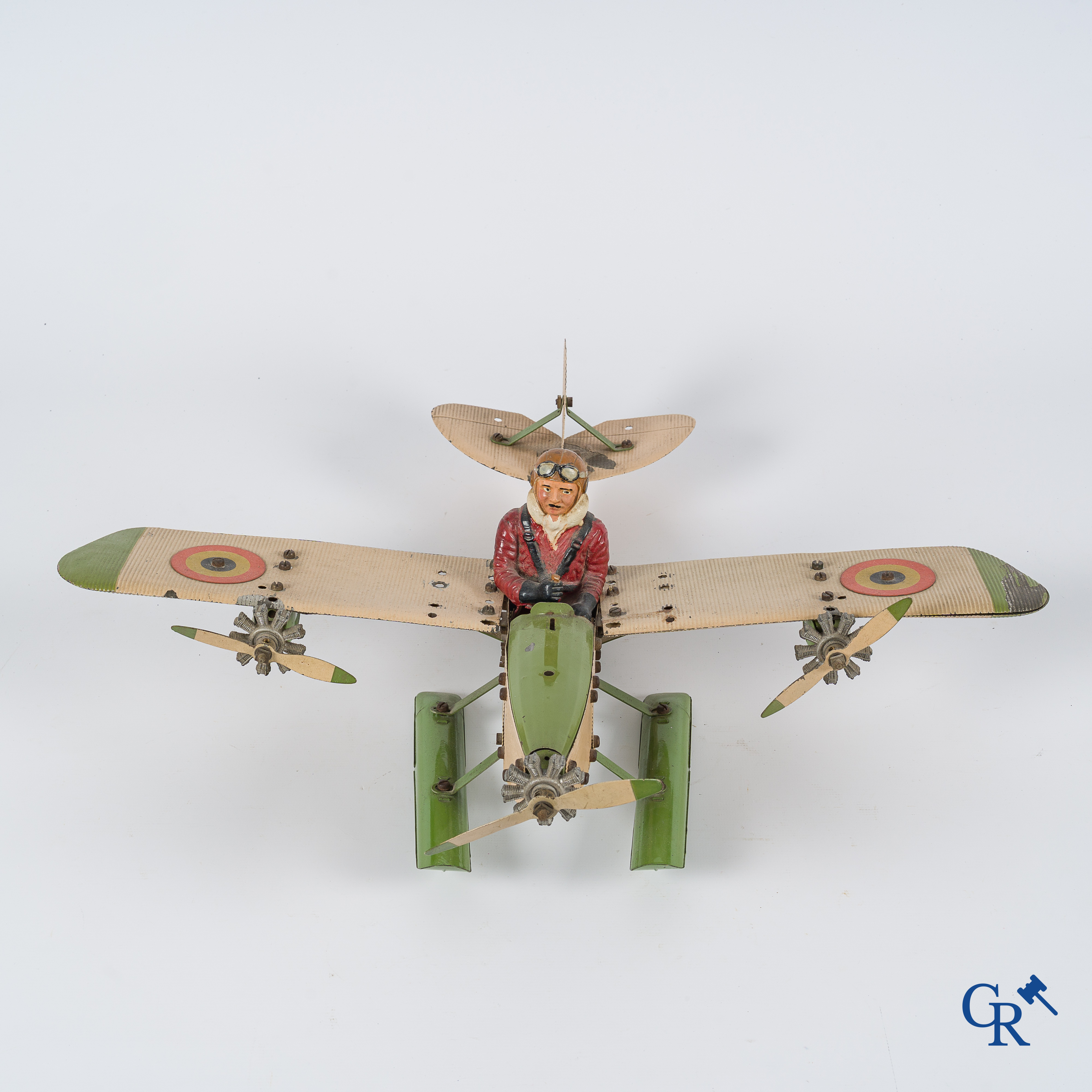 Oud speelgoed. Meccano Aeroplane Contstructor, watervliegtuig met originele piloot. Jaren '30.