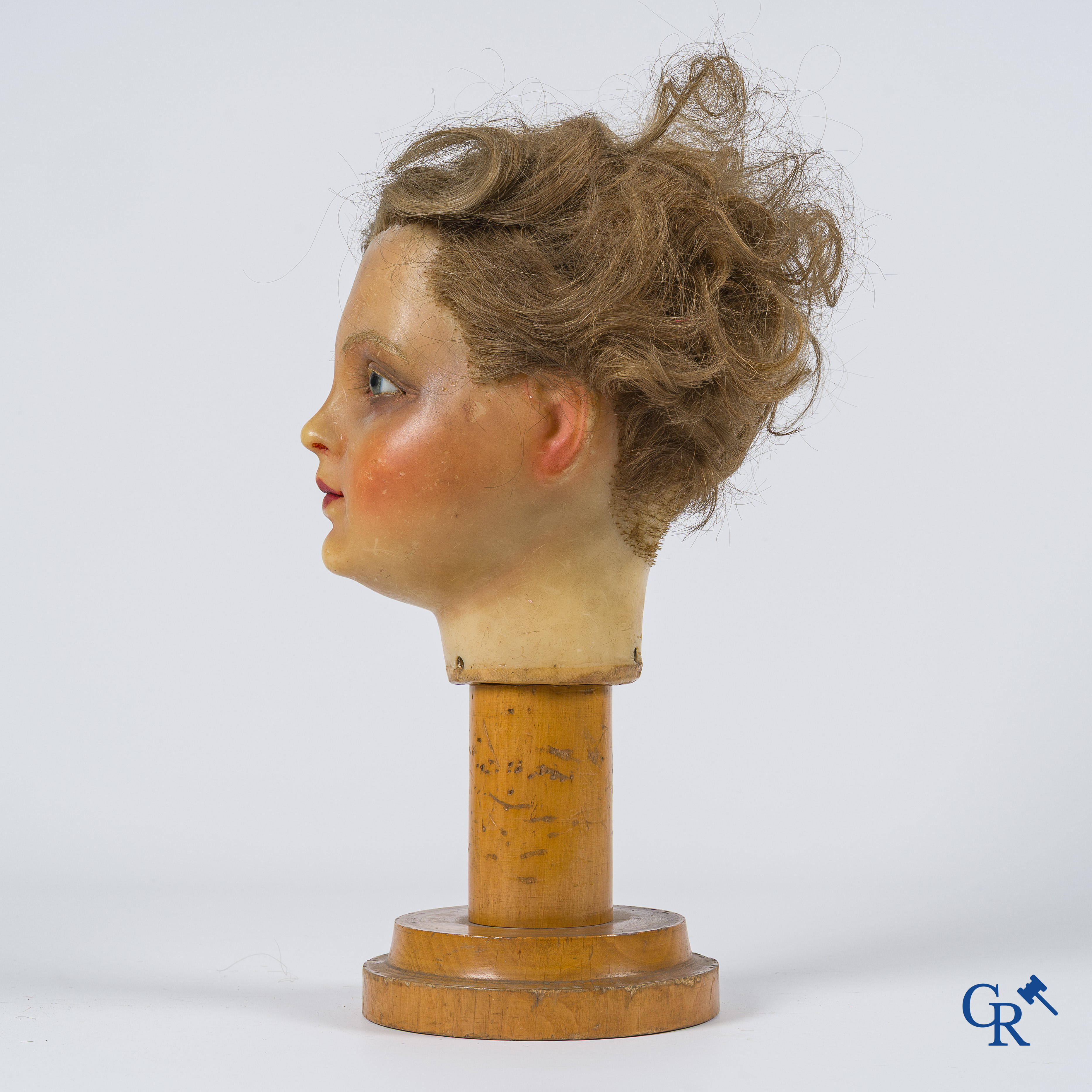 Hoofd in was met glazen ogen voor een kindermannequin. Hoogstwaarschijnlijk Pierre Imans. Circa 1900.