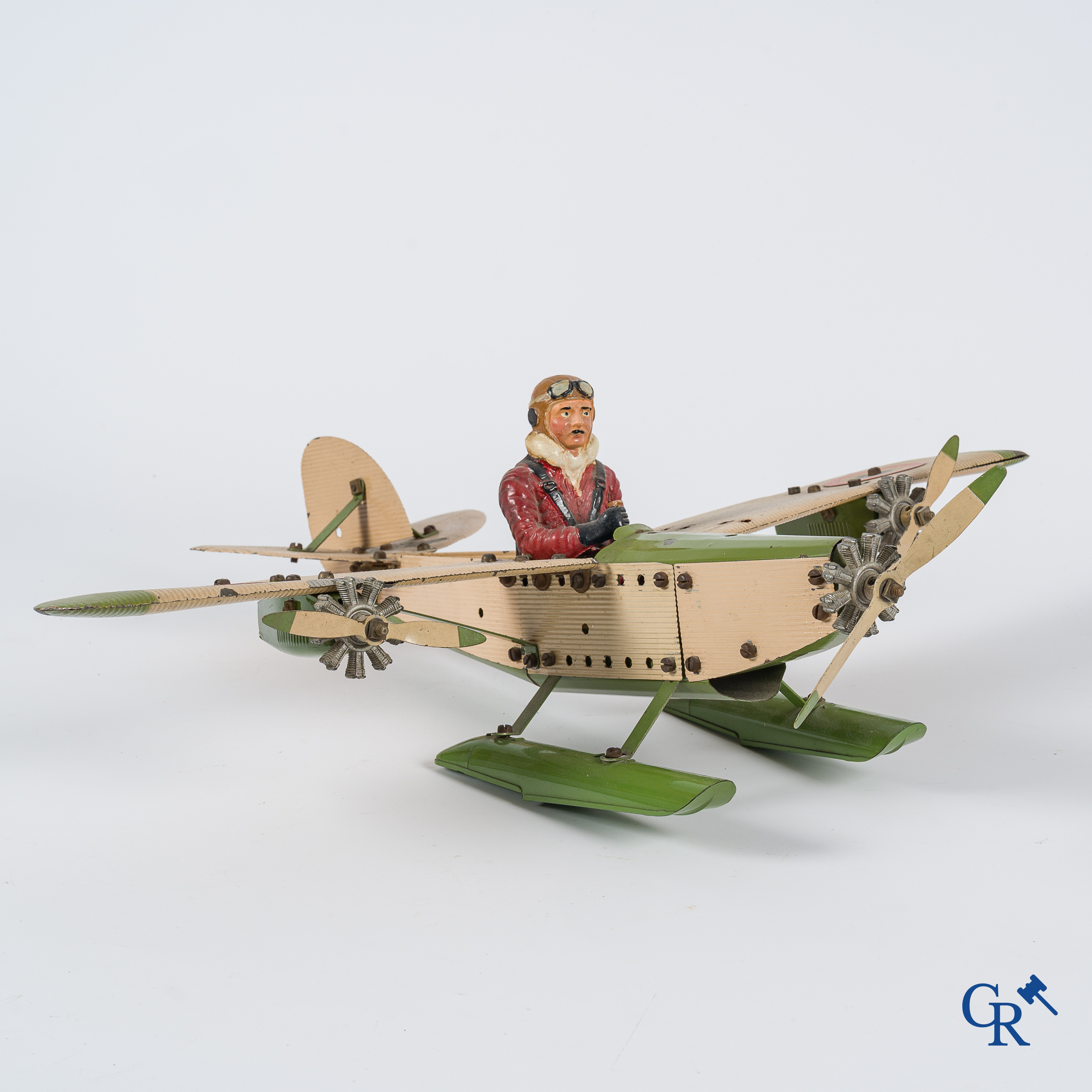 Oud speelgoed. Meccano Aeroplane Contstructor, watervliegtuig met originele piloot. Jaren '30.