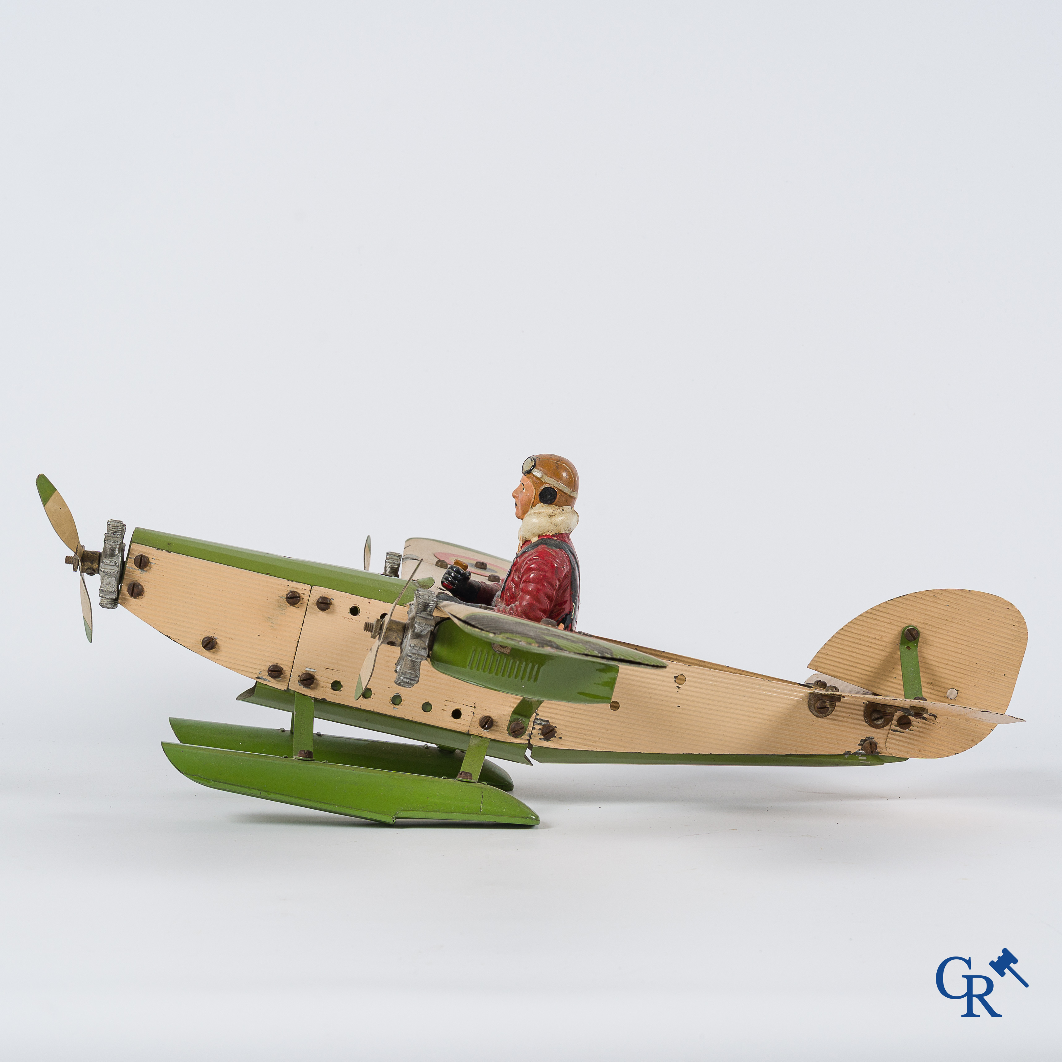 Oud speelgoed. Meccano Aeroplane Contstructor, watervliegtuig met originele piloot. Jaren '30.