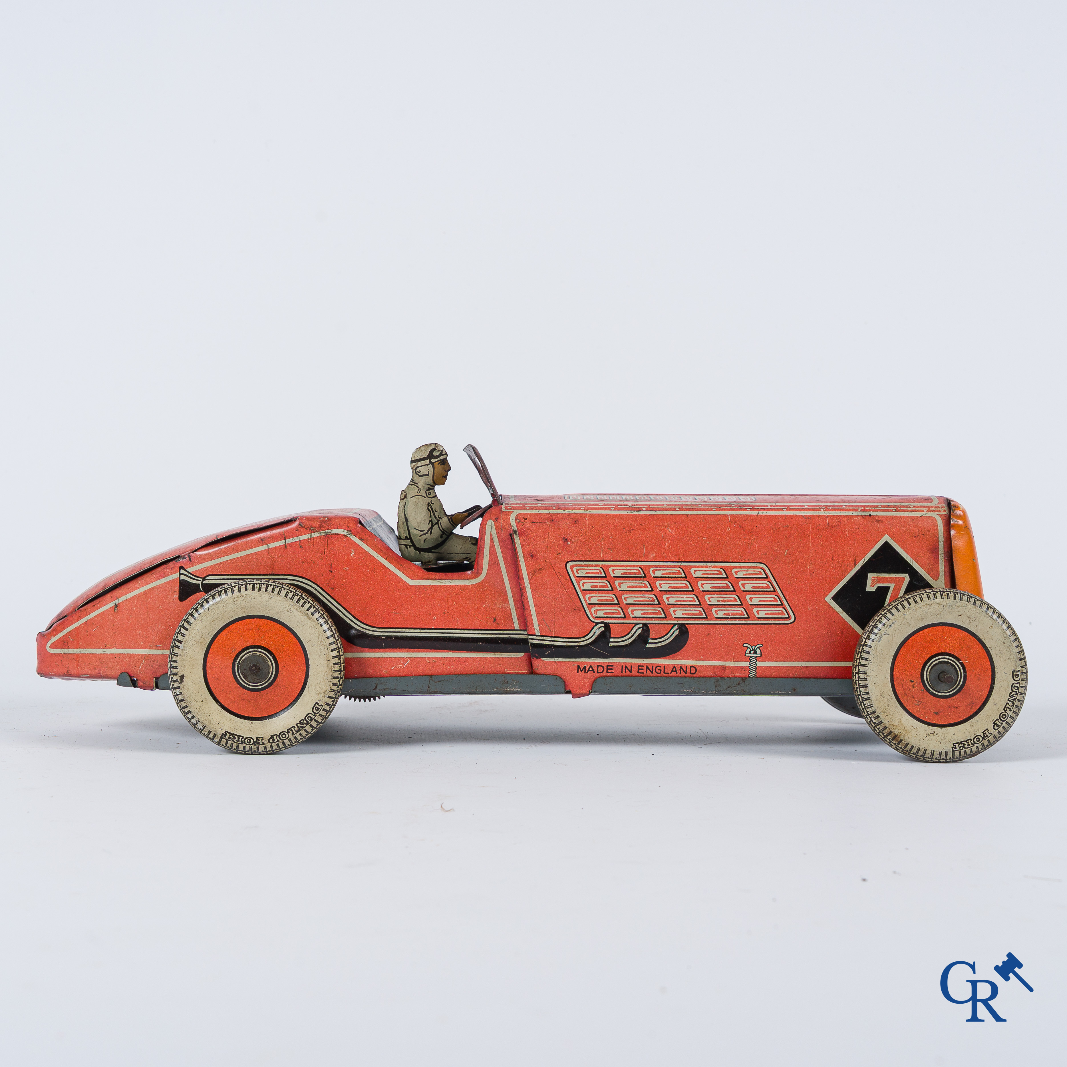 Oud speelgoed. Made in England. Racewagen met autopiloot. Blik met opwindmechanisme. Jaren '30-'40.