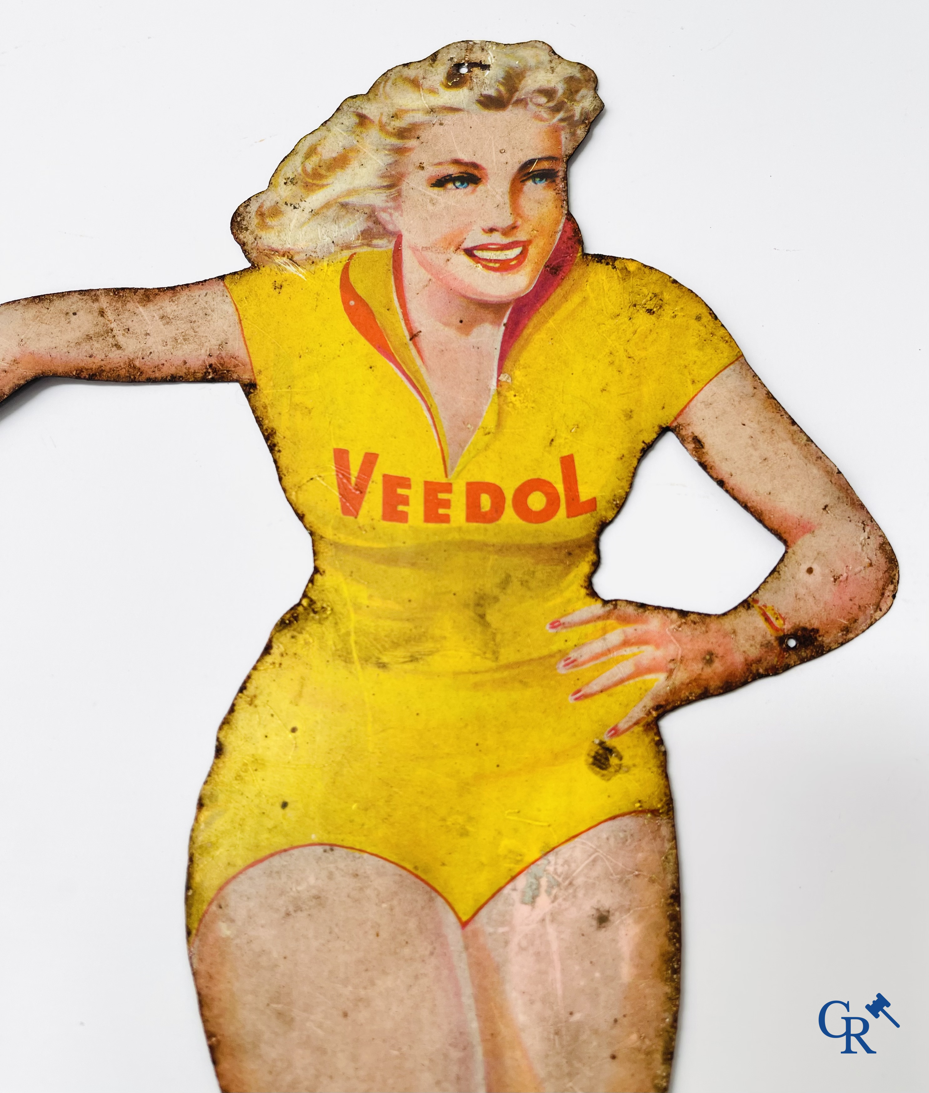 Veedol. Original Pin up or Ice Skating girl in metal. Publicity for Veedol motor oil. 1950's-60's.