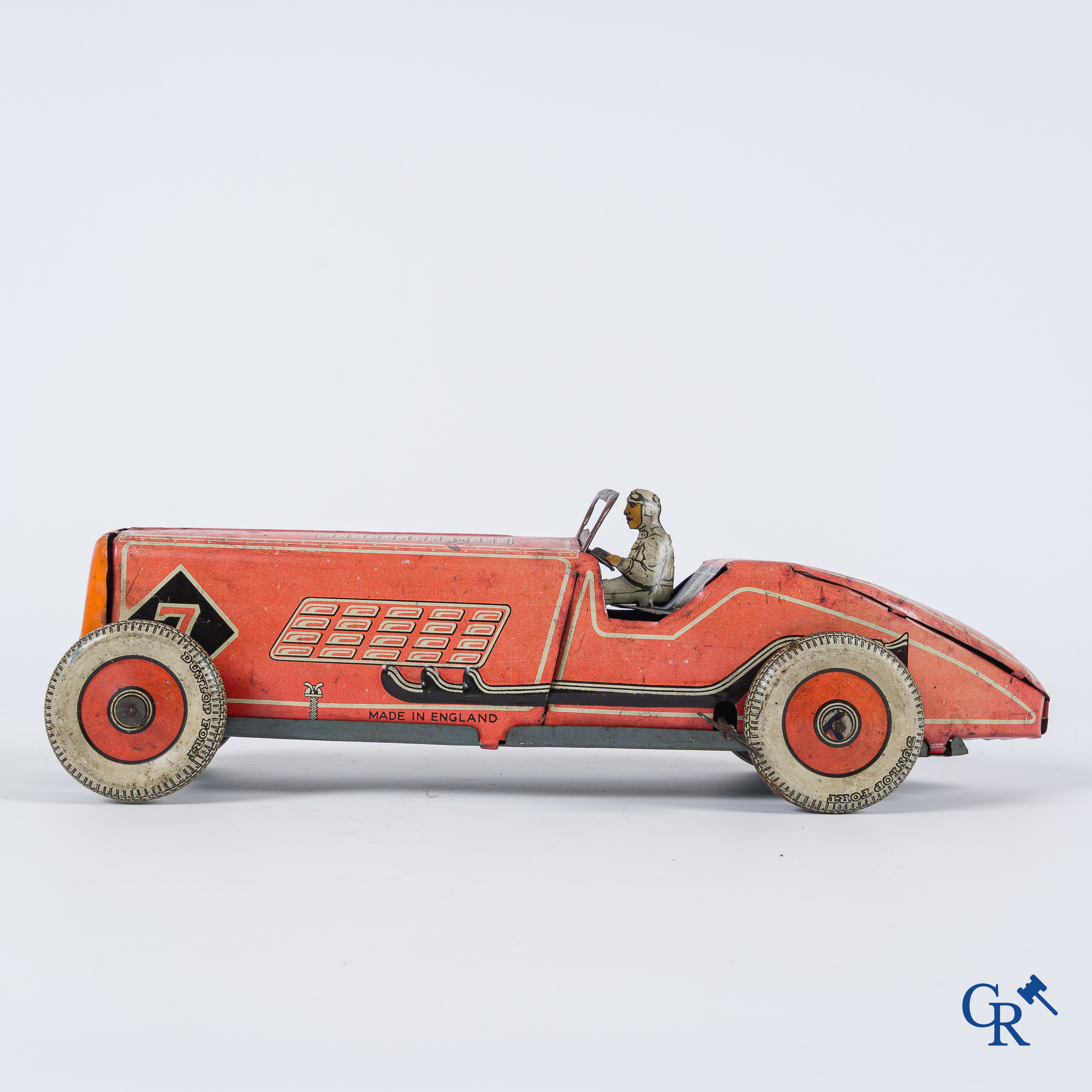Oud speelgoed. Made in England. Racewagen met autopiloot. Blik met opwindmechanisme. Jaren '30-'40.