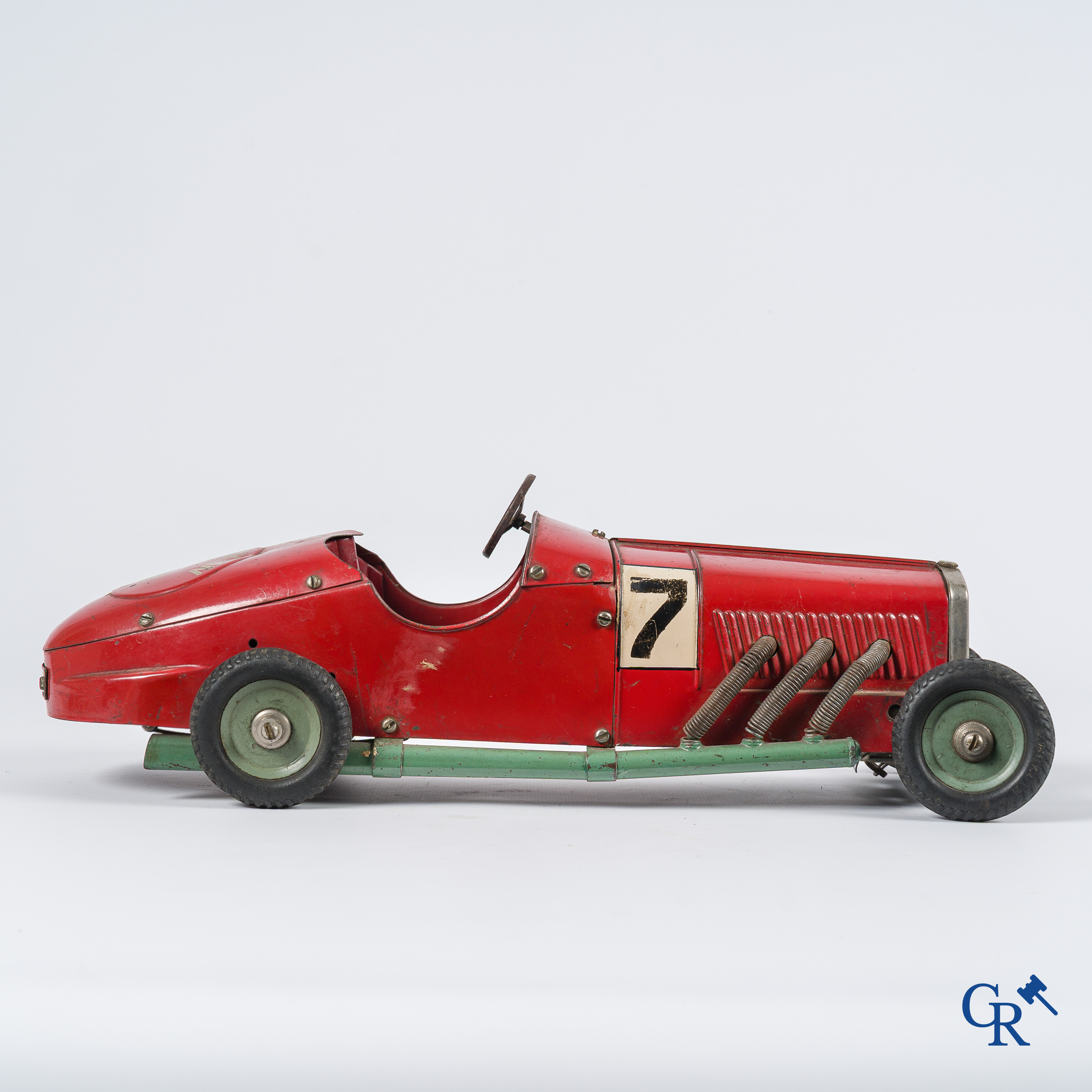 Märklin. Oud speelgoed. Originele opwindbare Mercedes modelauto in beschilderd blik. 30'er jaren.