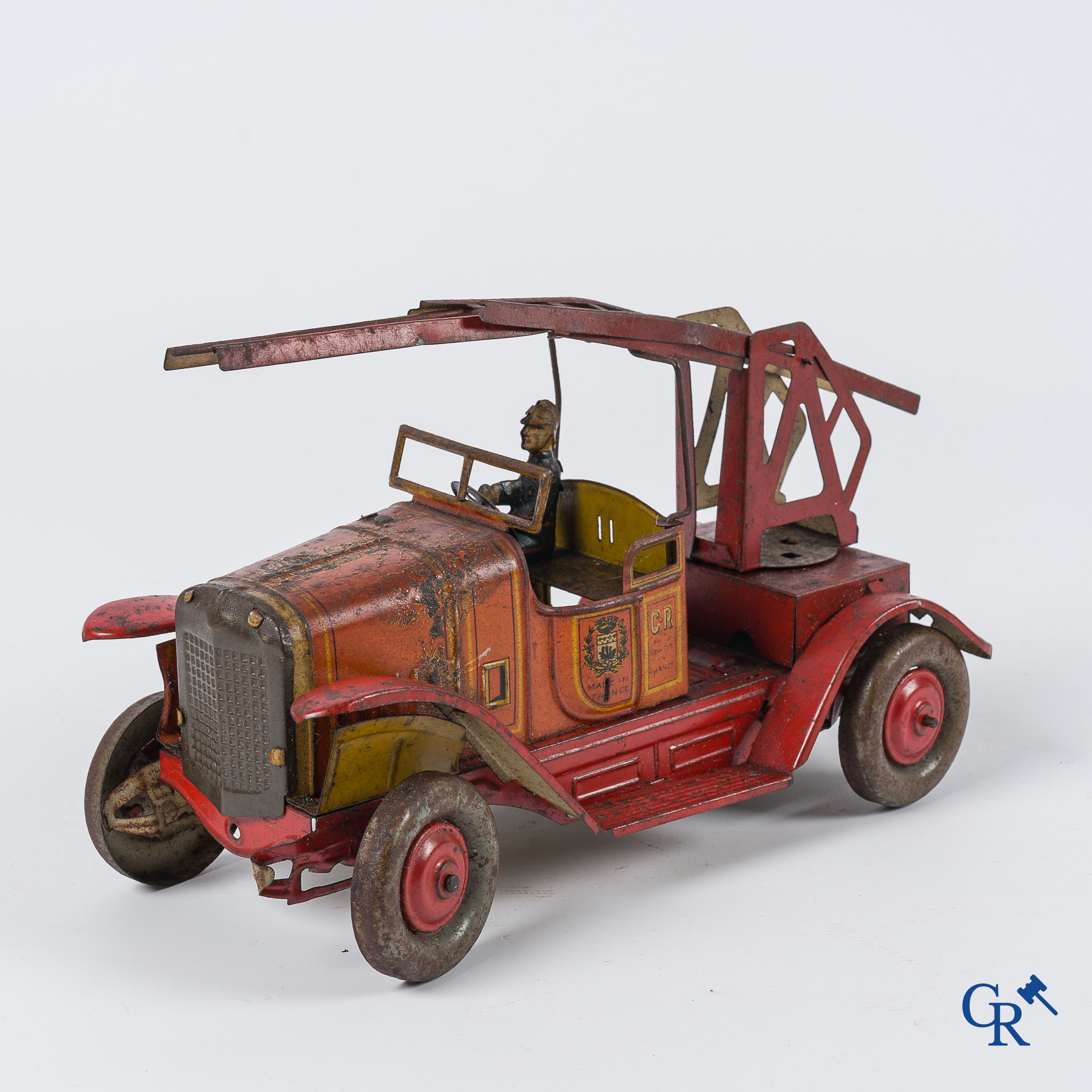 Oud speelgoed. Charles Rossignol, Frankrijk. Brandweerwagen in beschilderd blik.