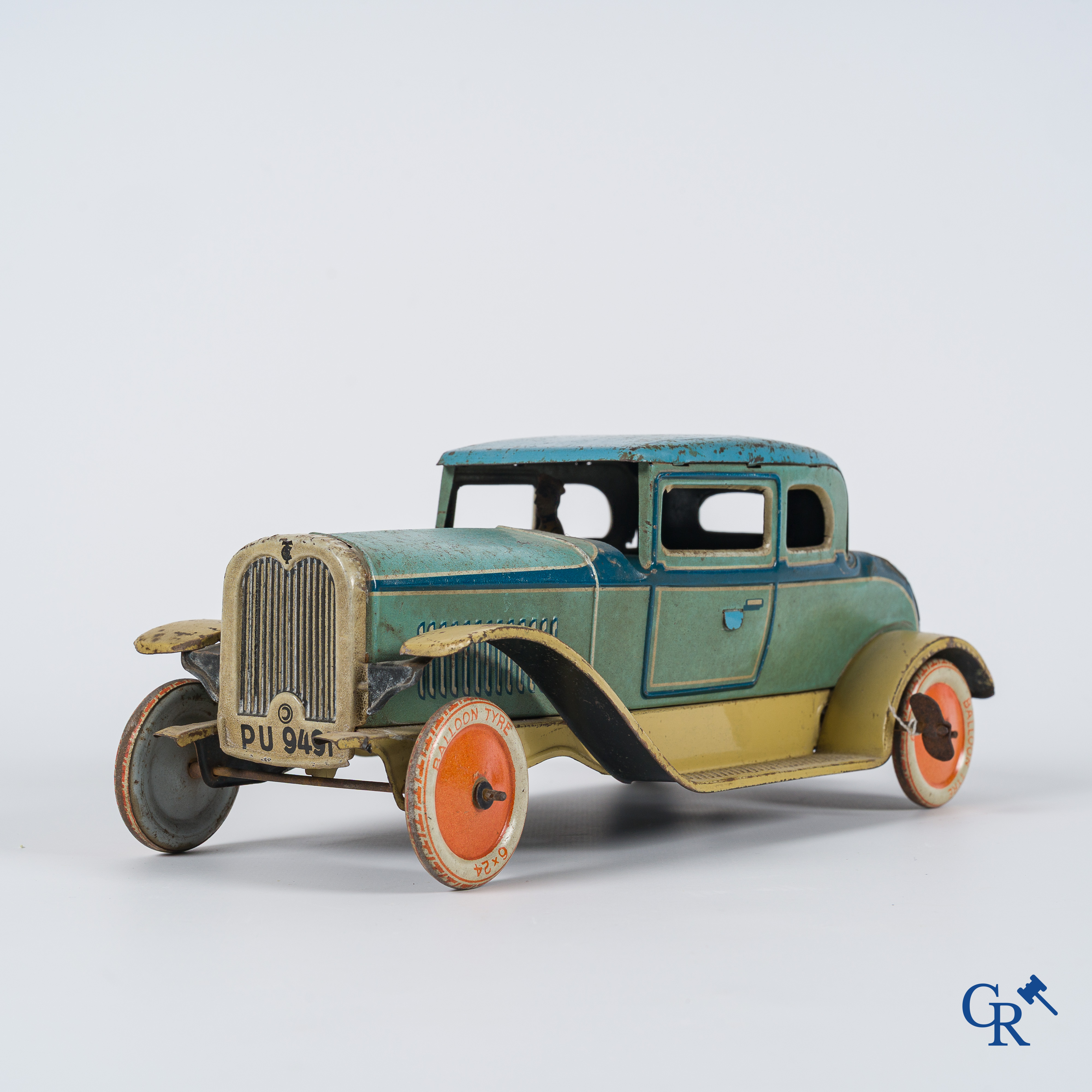 Oud speelgoed. Tipp & Co., Tippco. Duitsland. Coupé in metaal met opwindmechanisme. Jaren '30.