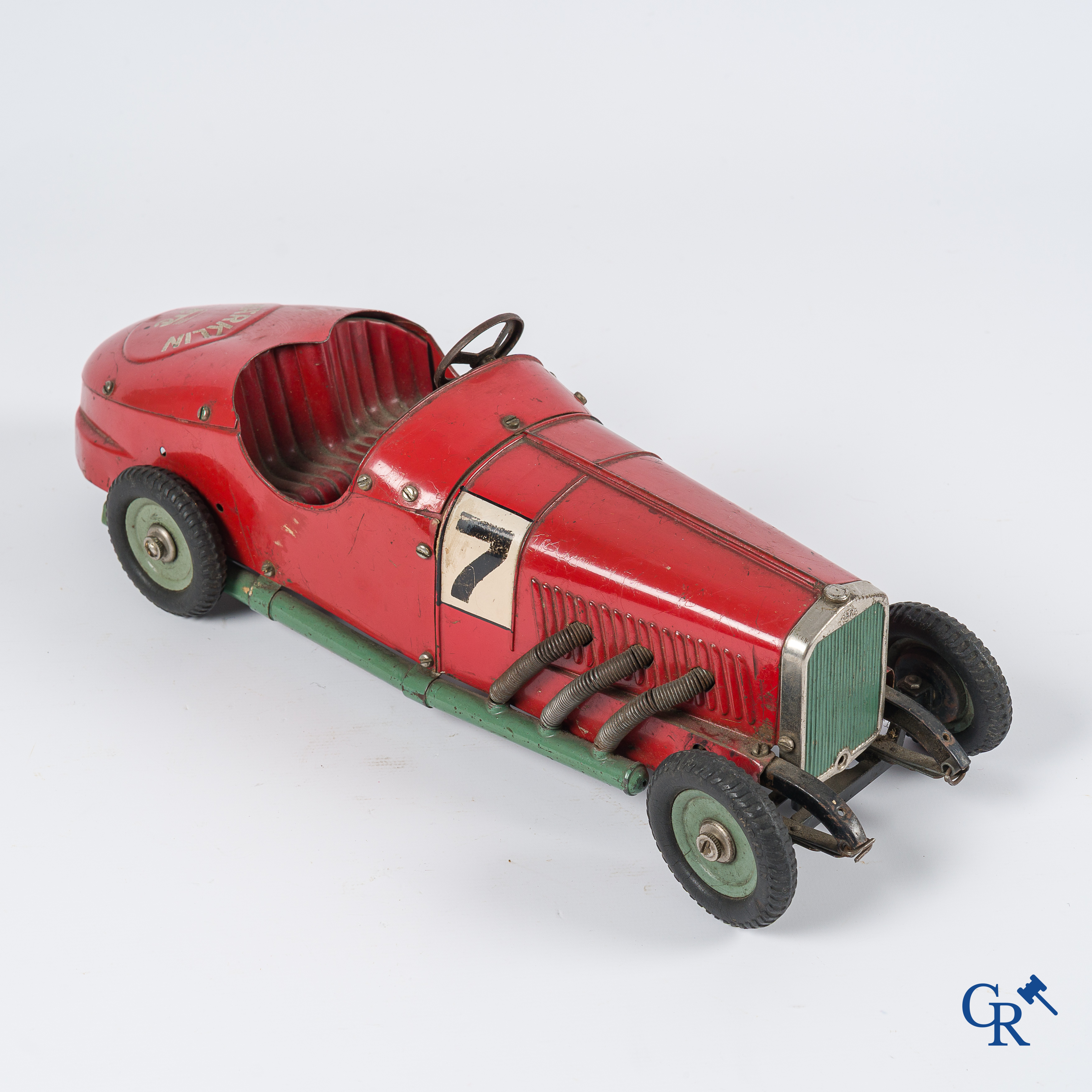 Märklin. Oud speelgoed. Originele opwindbare Mercedes modelauto in beschilderd blik. 30'er jaren.