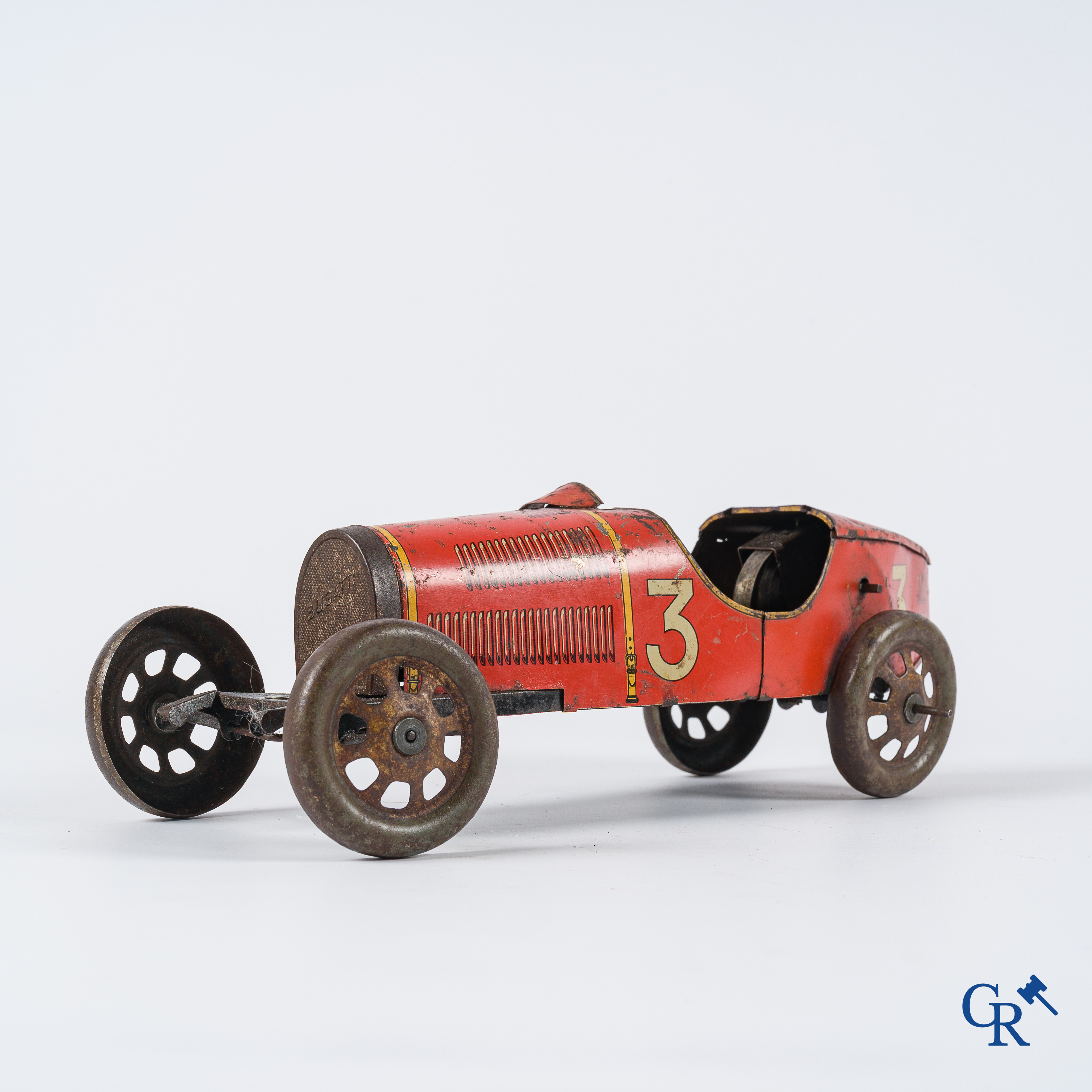 Oud Speelgoed. Jep, Frankrijk. Bugatti n°3, mechanische racewagen in beschilderd blik. Circa 1930.