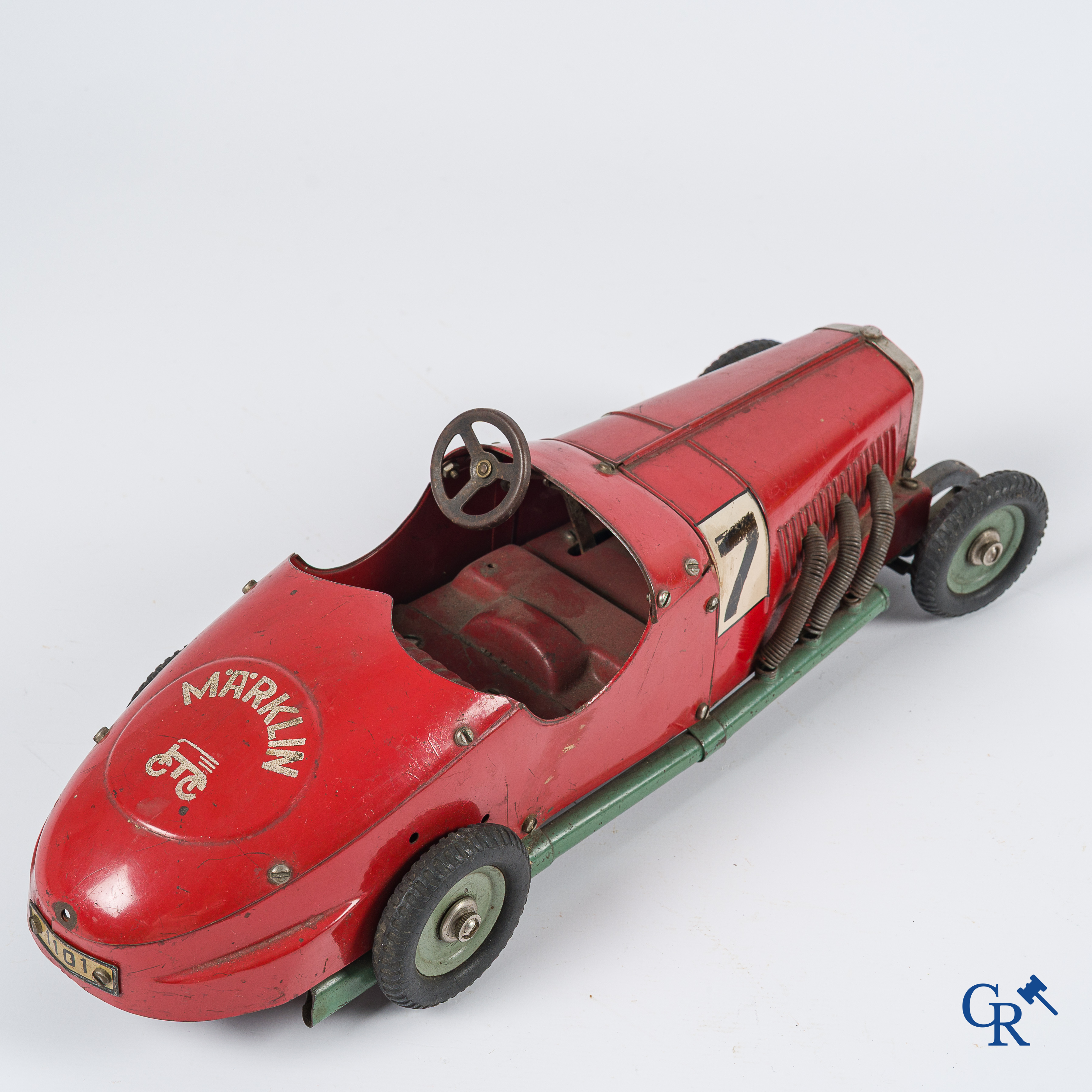 Märklin. Oud speelgoed. Originele opwindbare Mercedes modelauto in beschilderd blik. 30'er jaren.