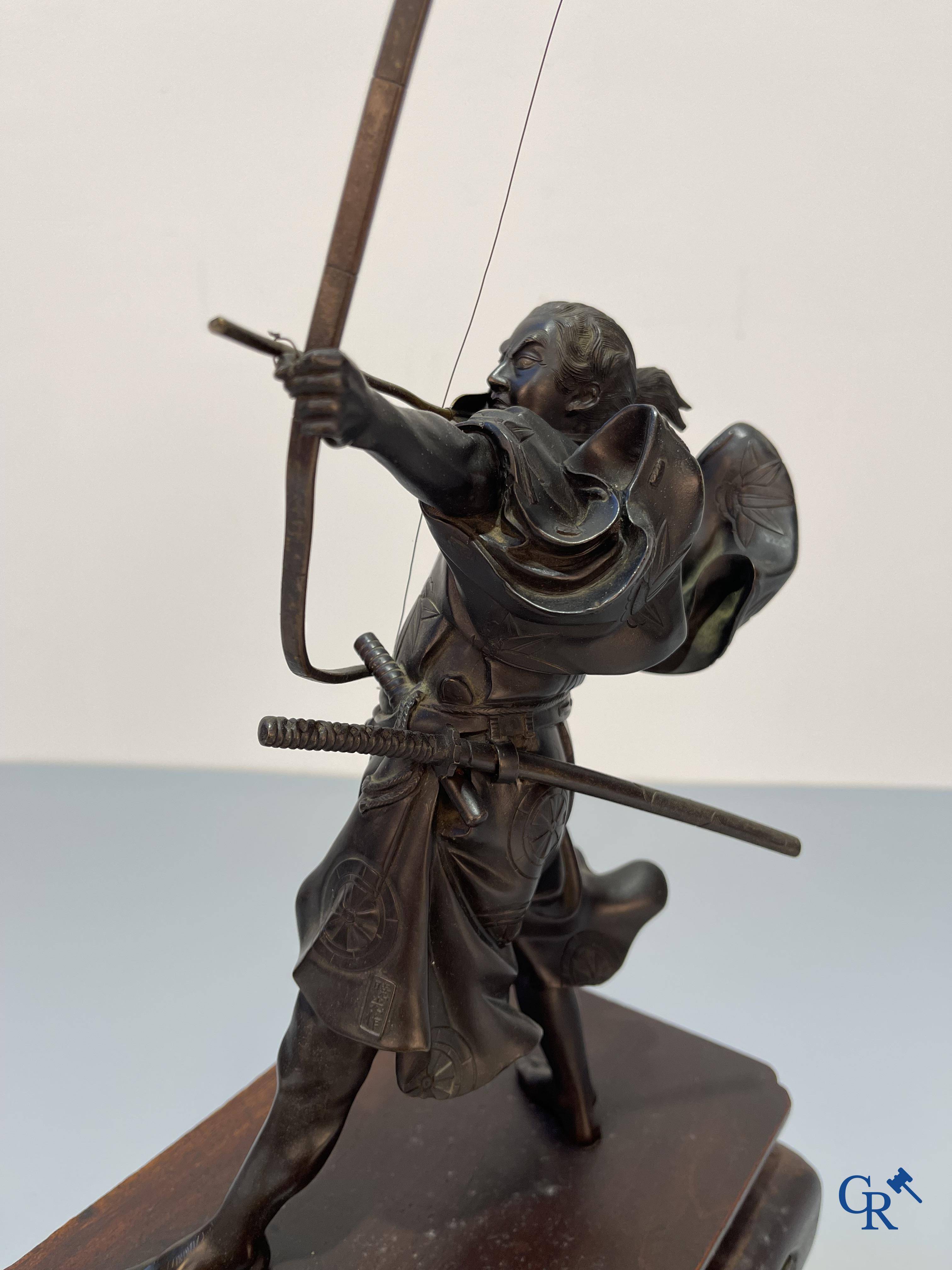 Asian Art, Japanese art, a bronze representation of a Samurai archer. Signed. Meiji period.