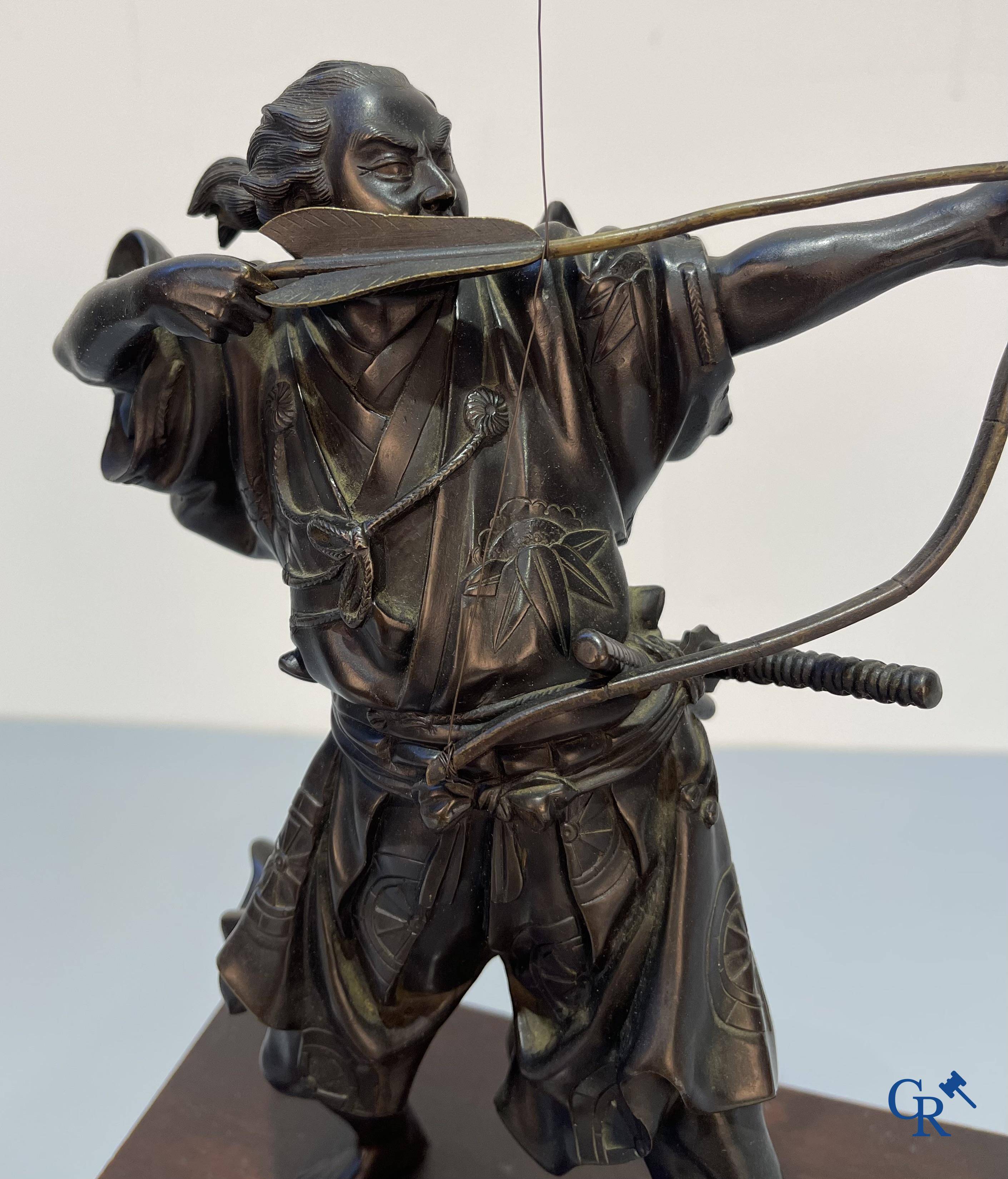 Asian Art, Japanese art, a bronze representation of a Samurai archer. Signed. Meiji period.