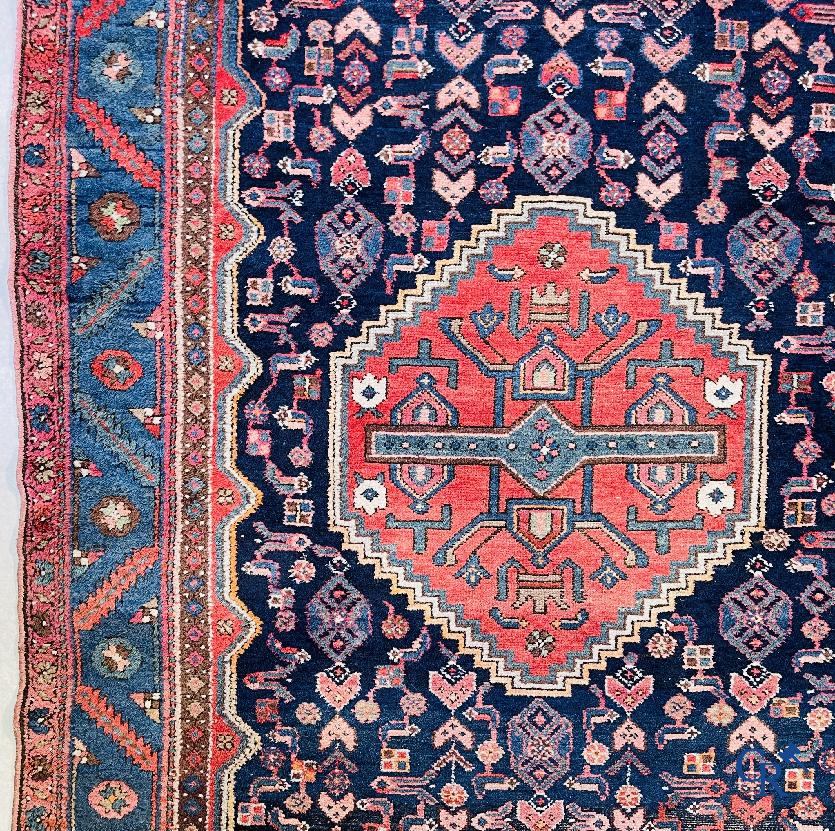 Oriental carpets, 2 antique hand-knotted Oriental carpets.