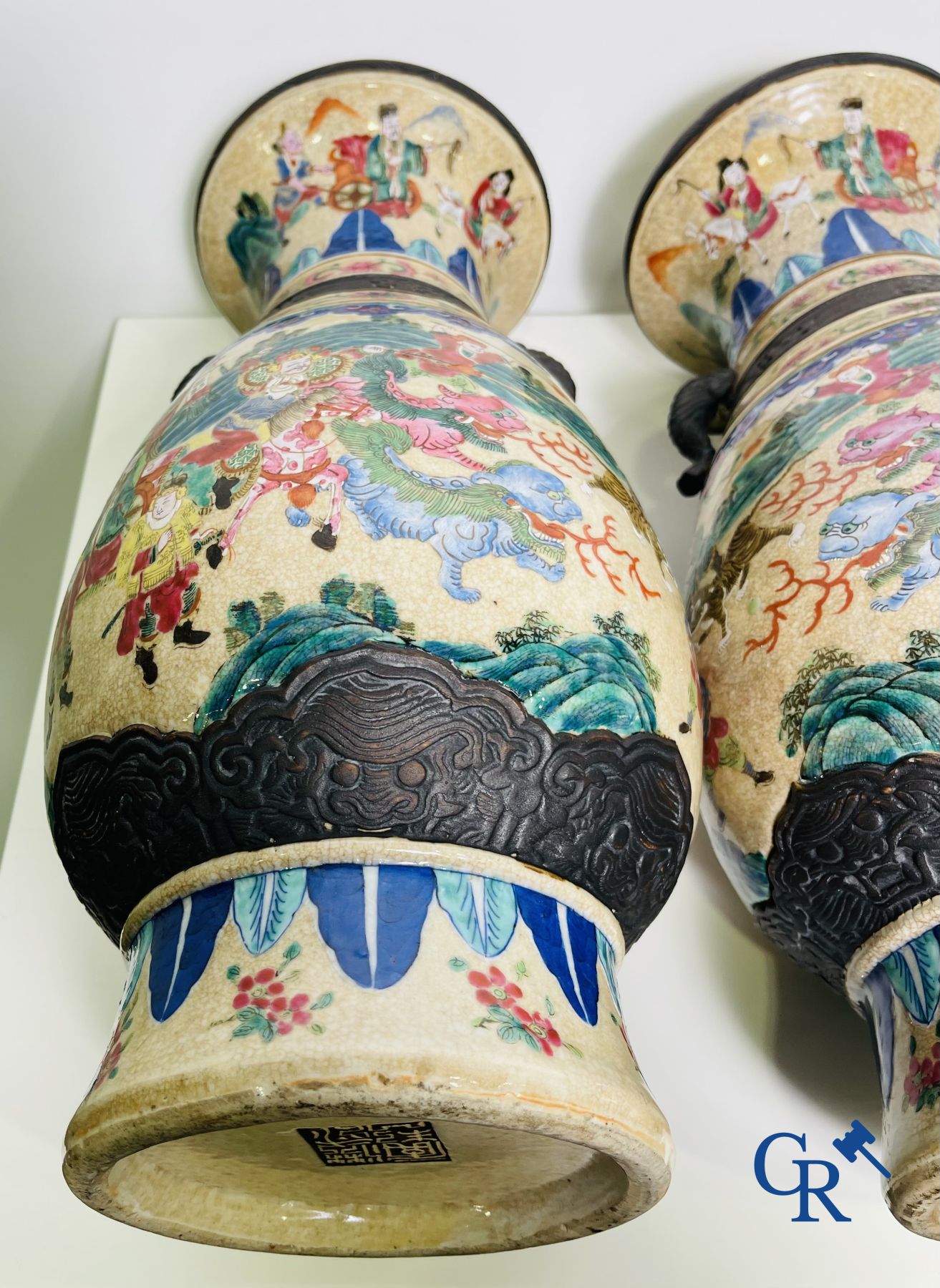 Asian Art: A pair of Chinese Nanking vases with famille rose decor.