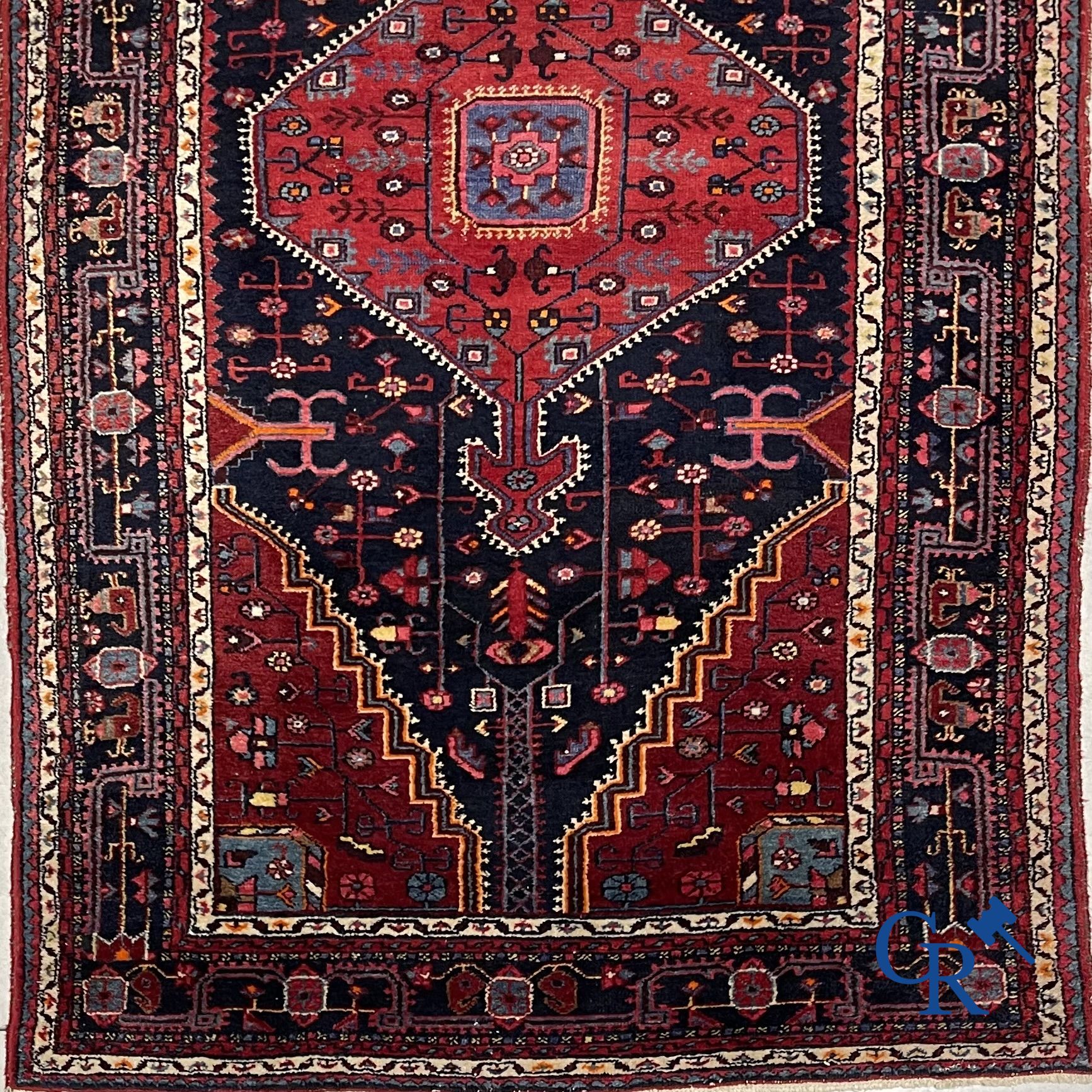 Oriental carpets: Oriental hand-knotted wool carpet.