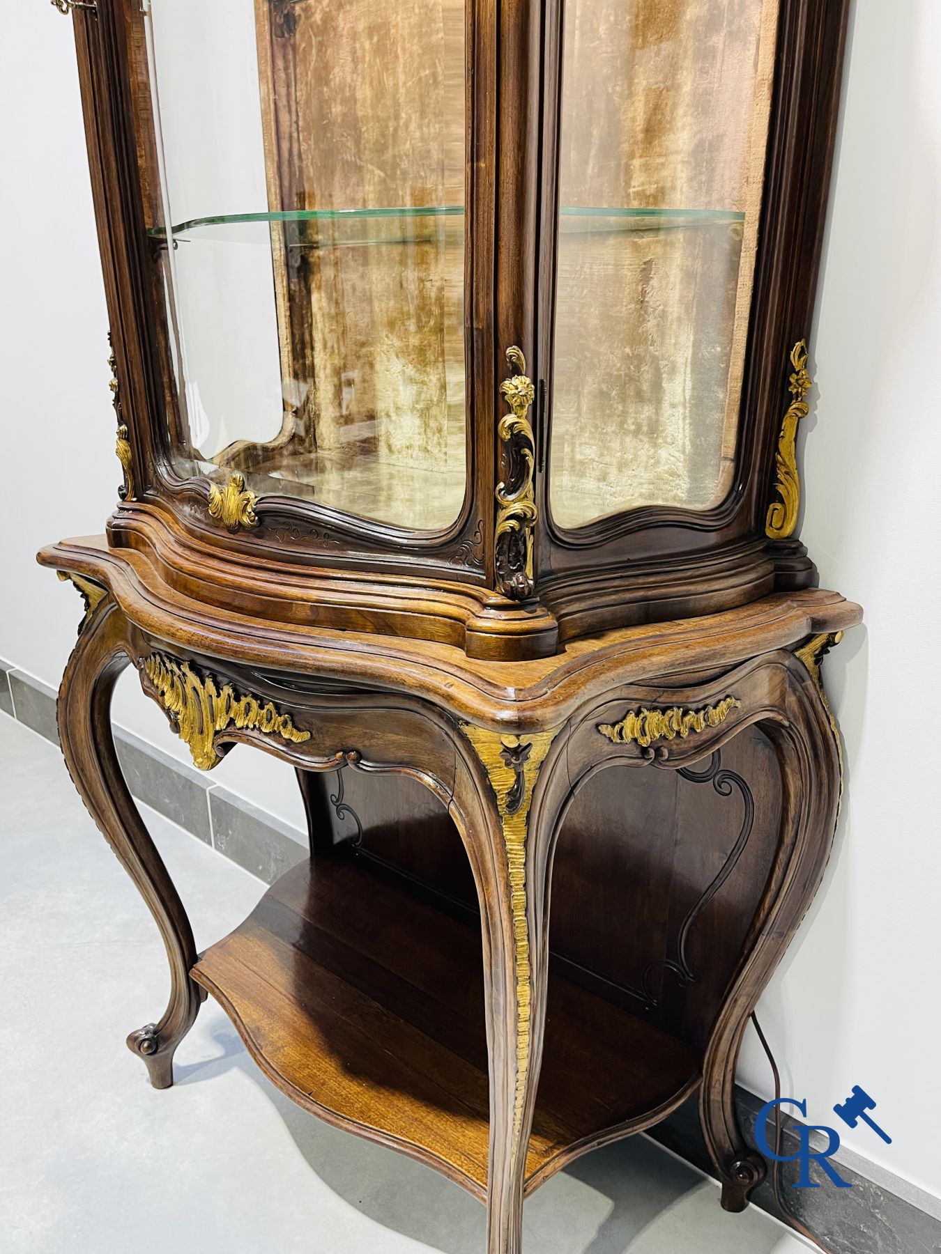 Showcase in walnut. LXV style. around 1900.