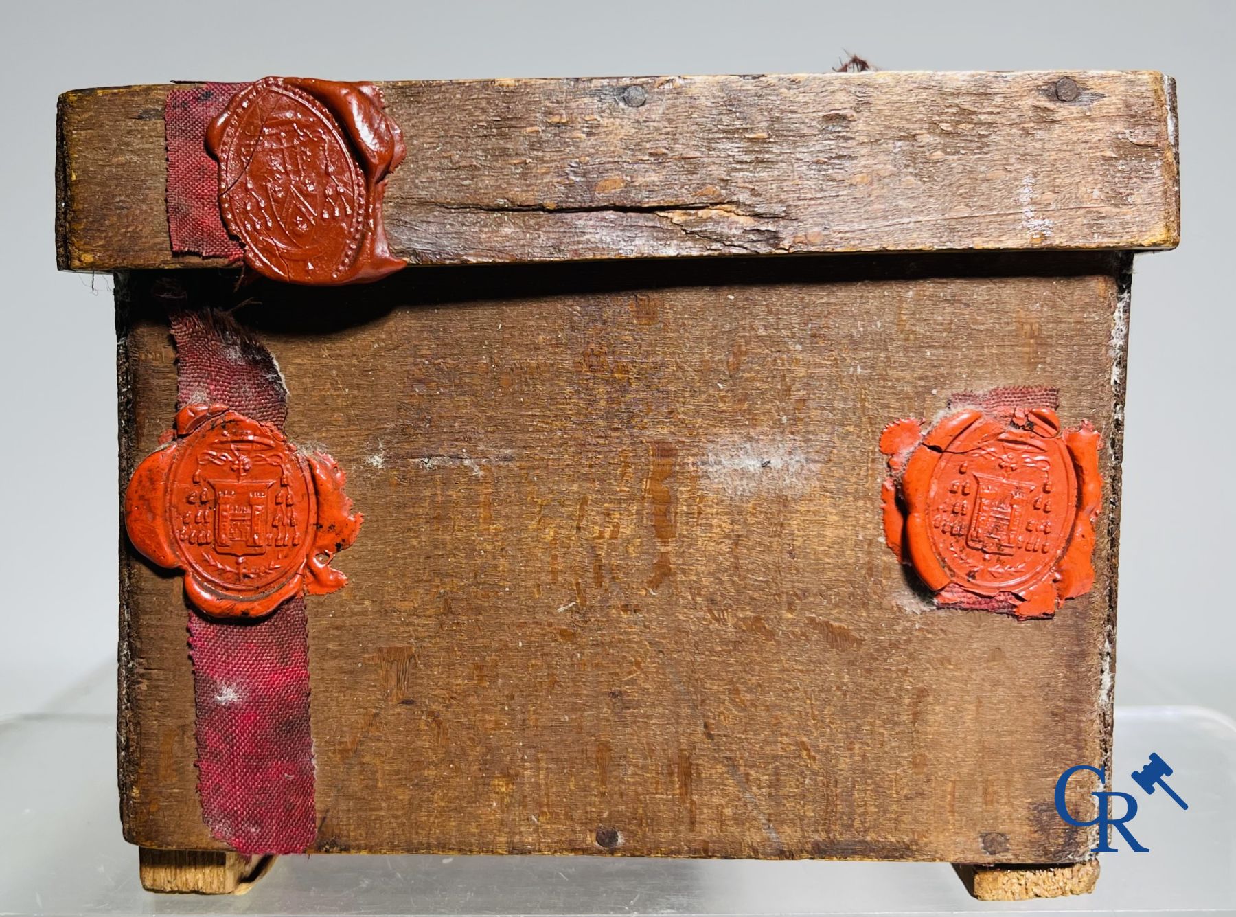 An antique wooden reliquary sealed with wax seals. Early 19th century.