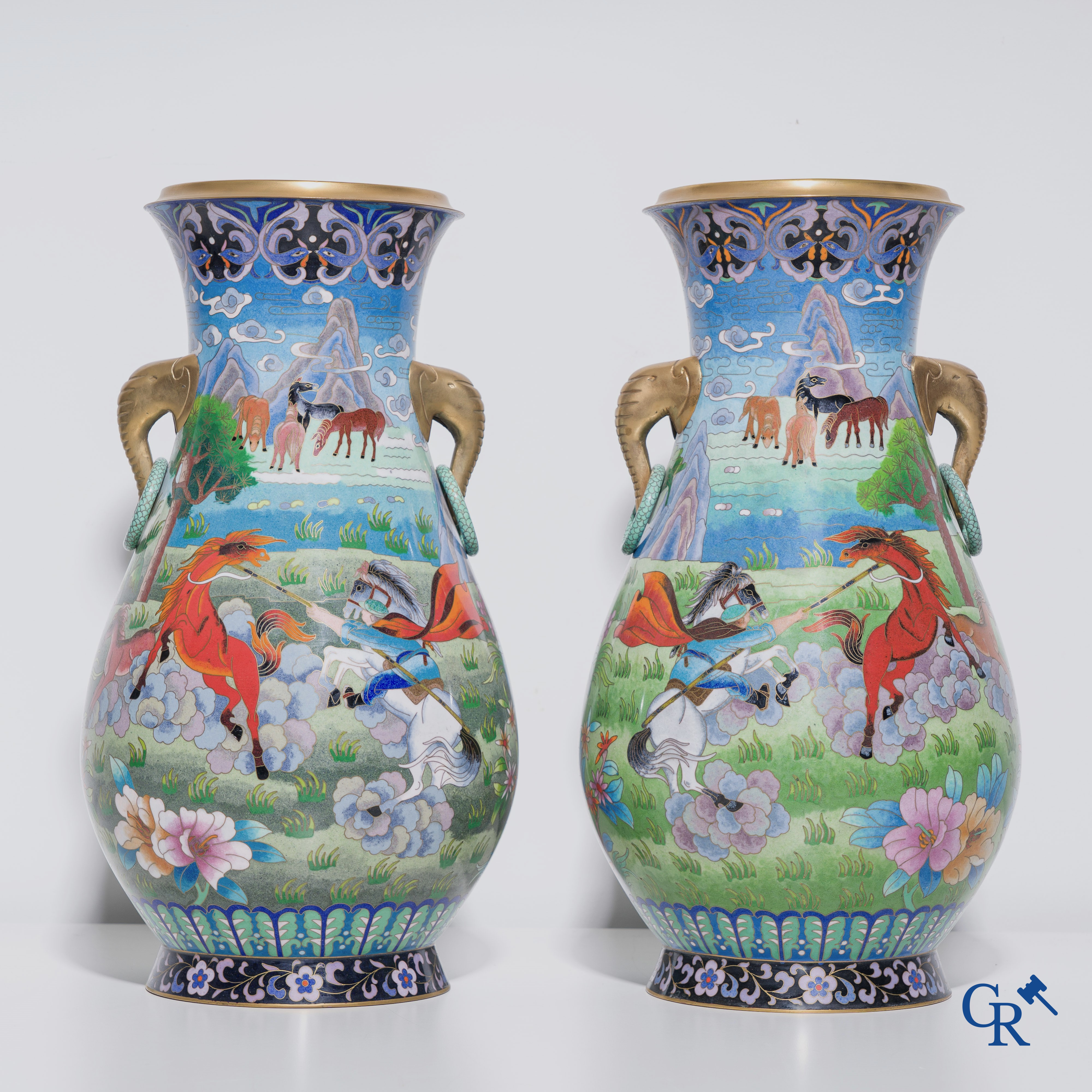 A pair of vases in Chinese cloisonné enamel with a decor of horses, circa 1980.