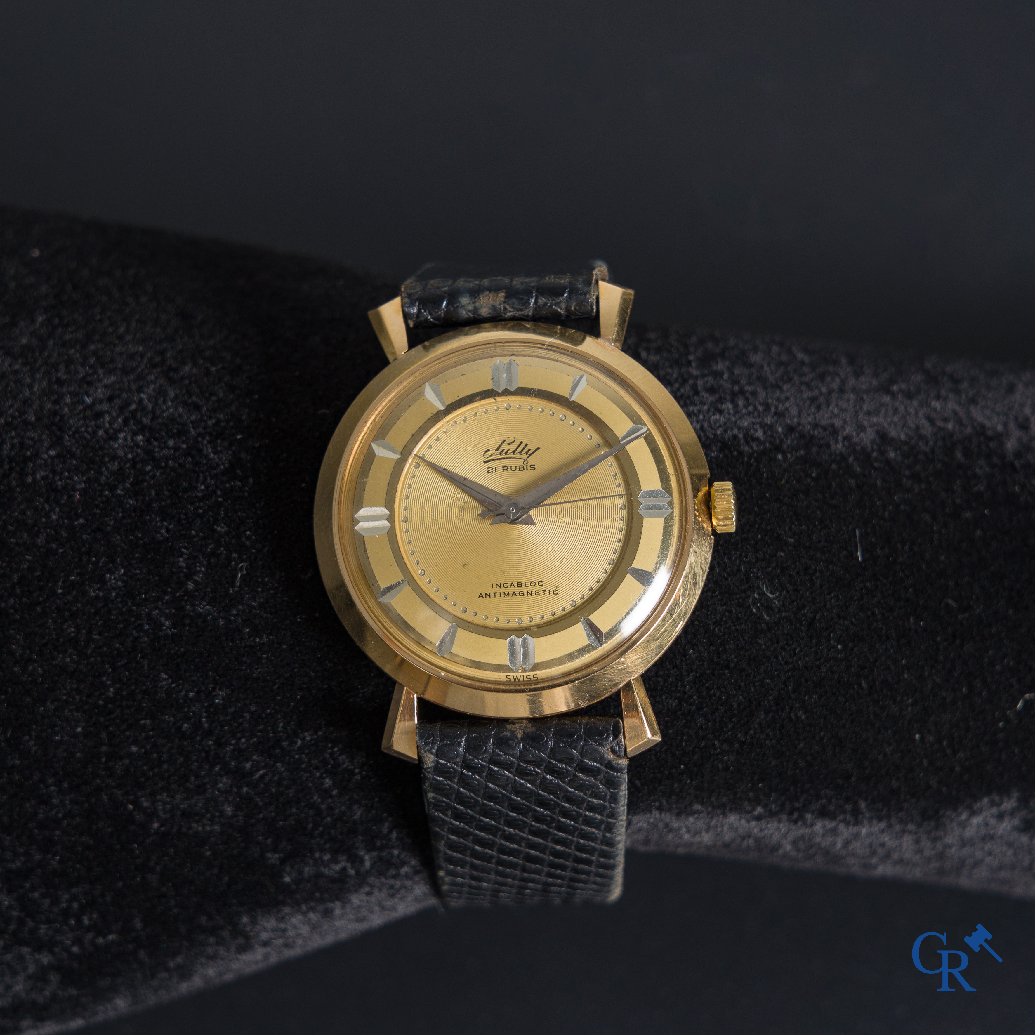 Watches: Sully, A men's wristwatch in gold 18K (750°/00).