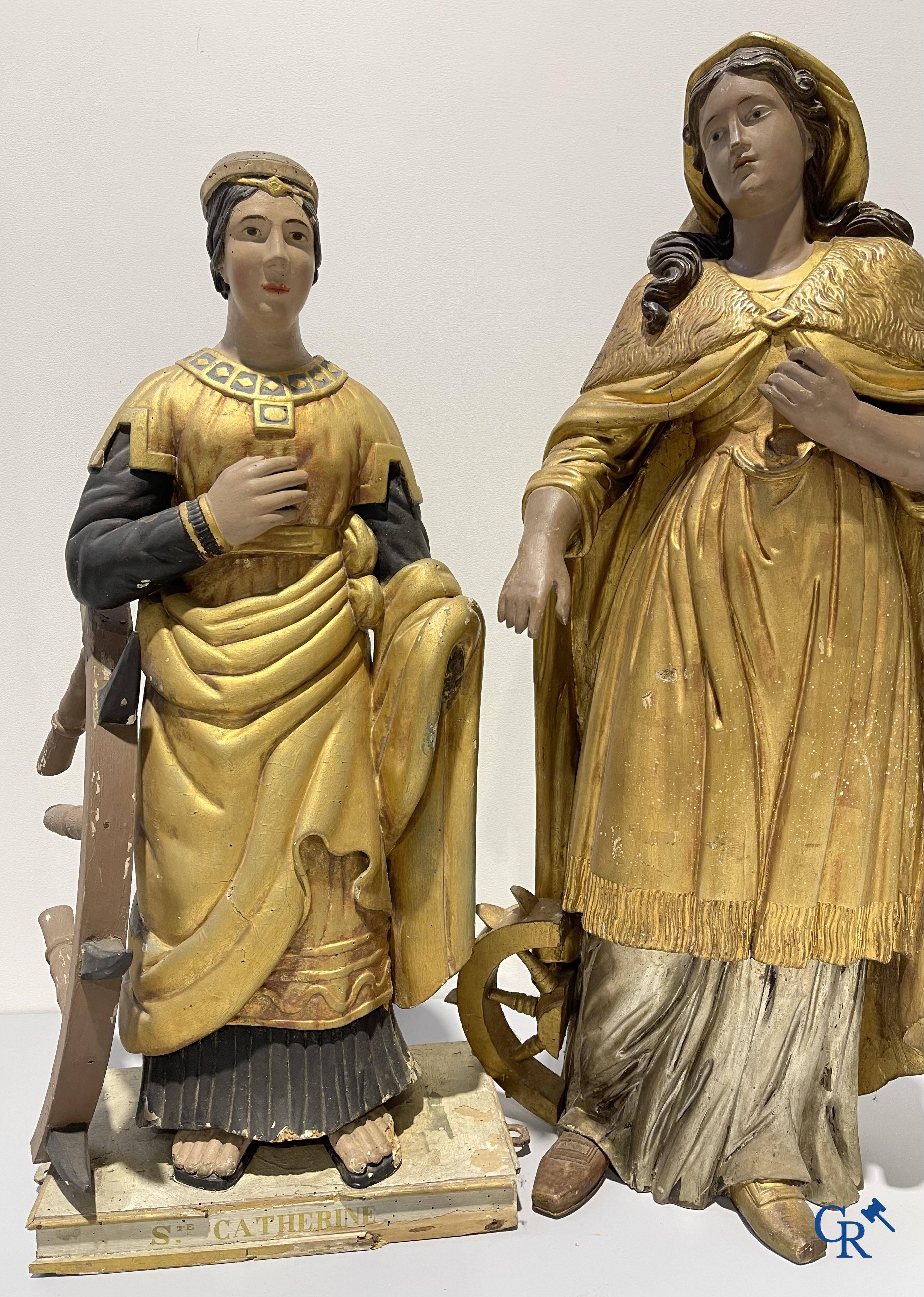 2 statues en bois polychrome représentant Sainte Catherine d'Alexandrie. Fin XVIIIème - début XIXème siècle.