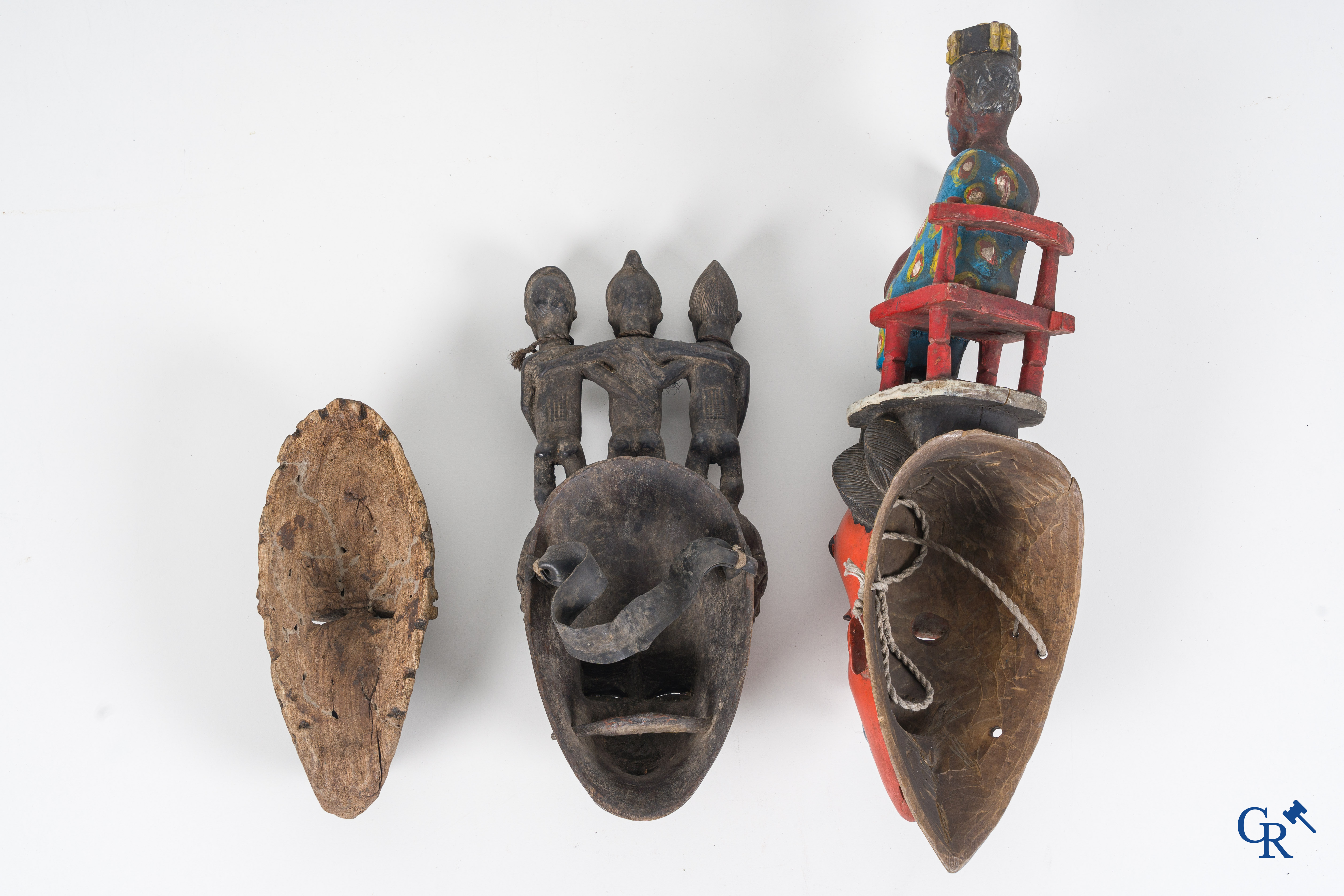 Tribal art, Primitive art. A lot with African objects, masks, bronze slave band, necklace and others.