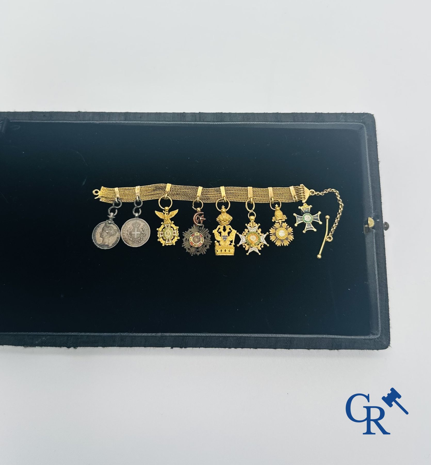 Médailles - Kroonorde Eretekens - Décoraties: Miniatuurketting in goud 18K met verschillende decoraties in reductie.