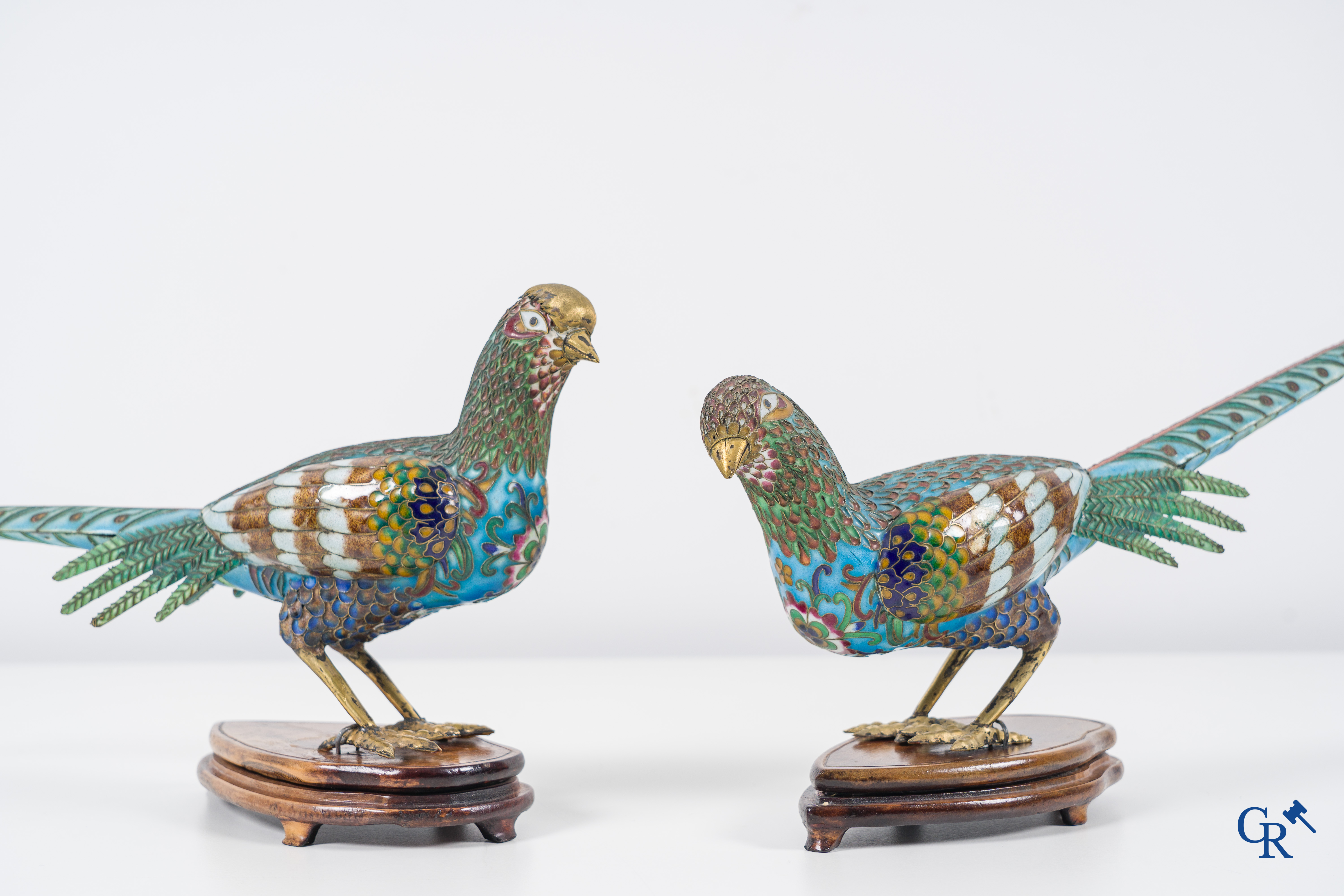 Asian Art: Chinese cloisonné. A pair of pheasants in finely crafted cloisonné. 20th century.